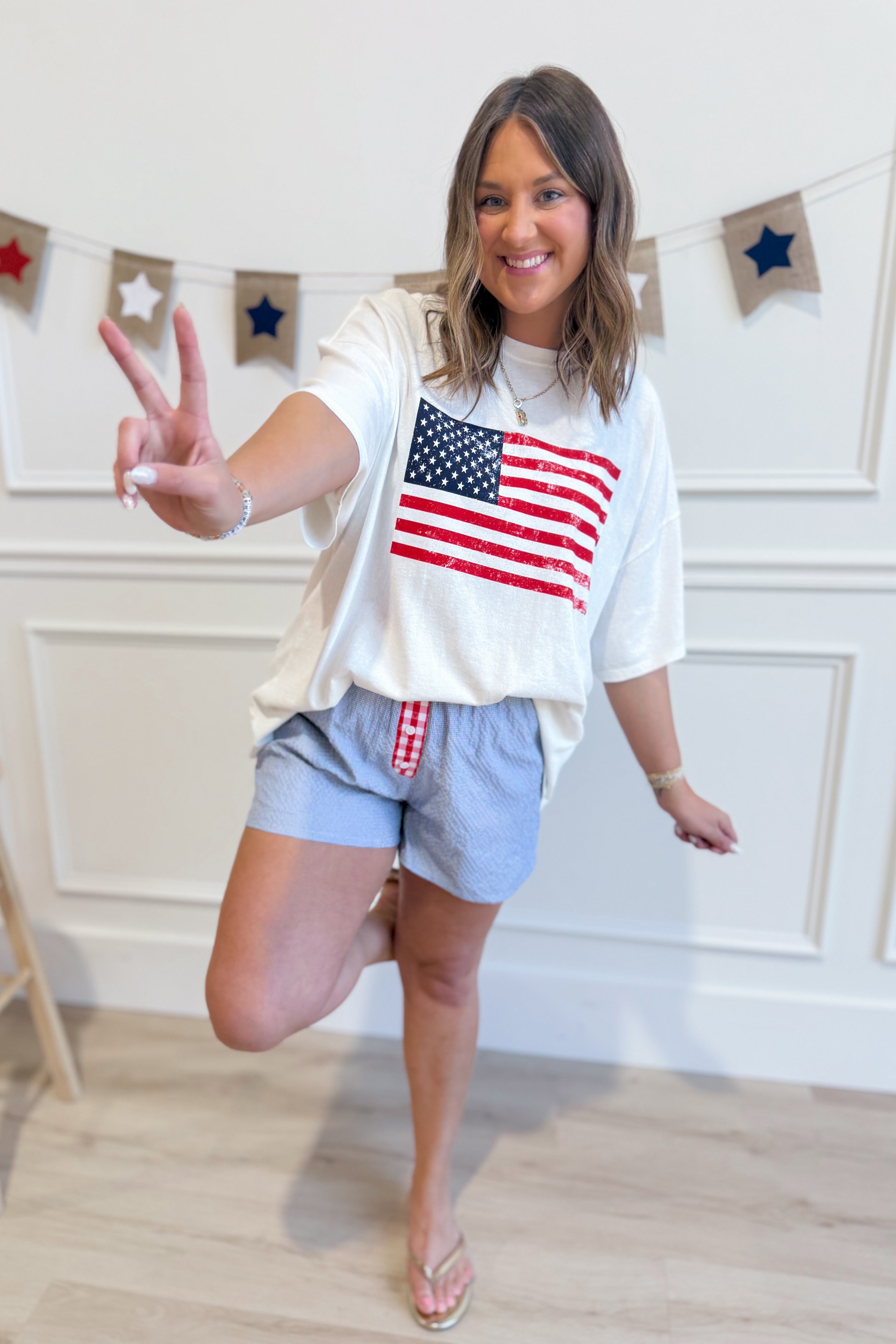 Alexander American Flag T-Shirt by HYFVE featuring a graphic print of the American flag on a casual tee.