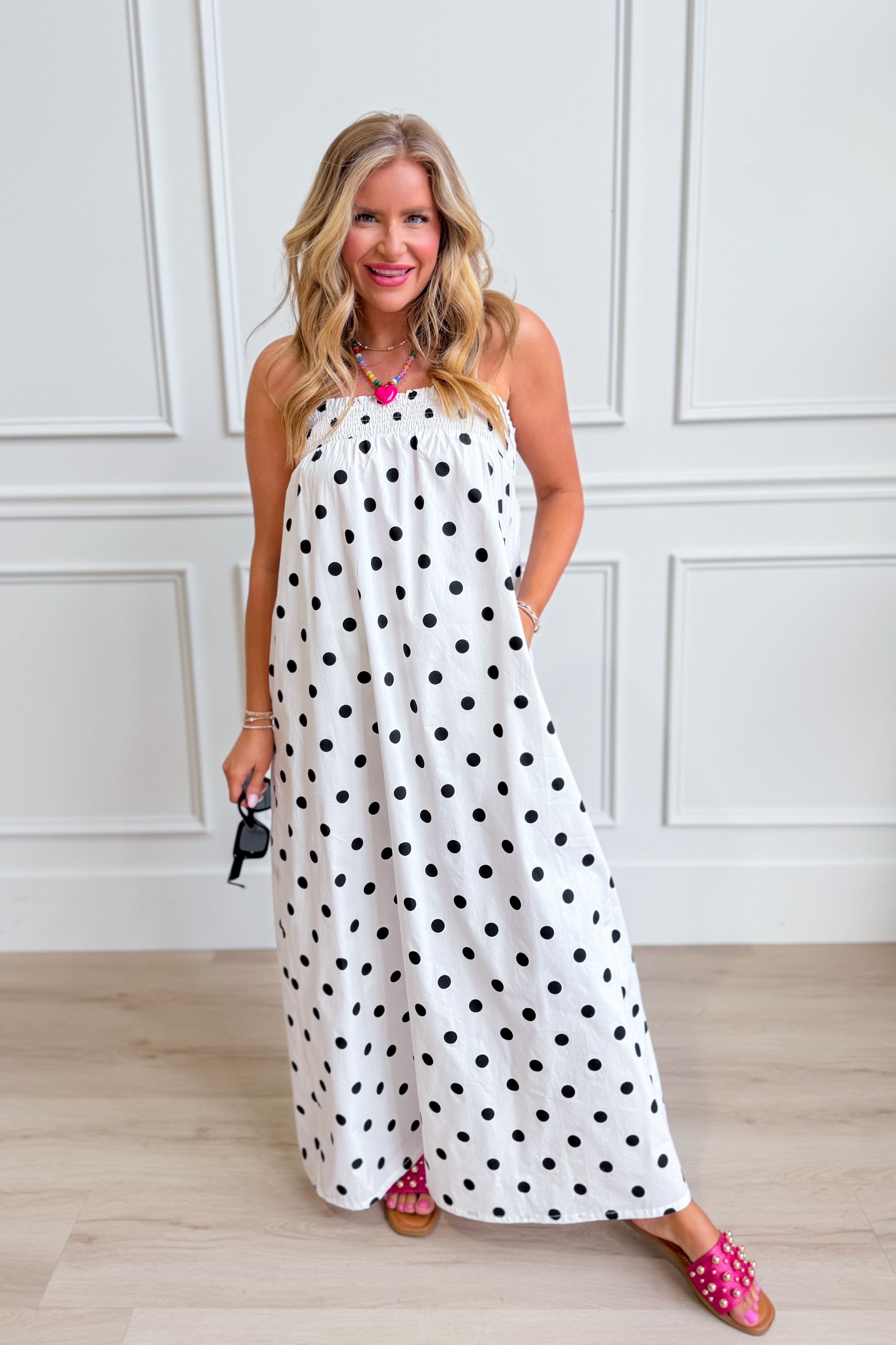 THINGS BETWEEN Laney polka dot maxi dress featuring a flowy silhouette and stylish pattern, perfect for dressy occasions.
