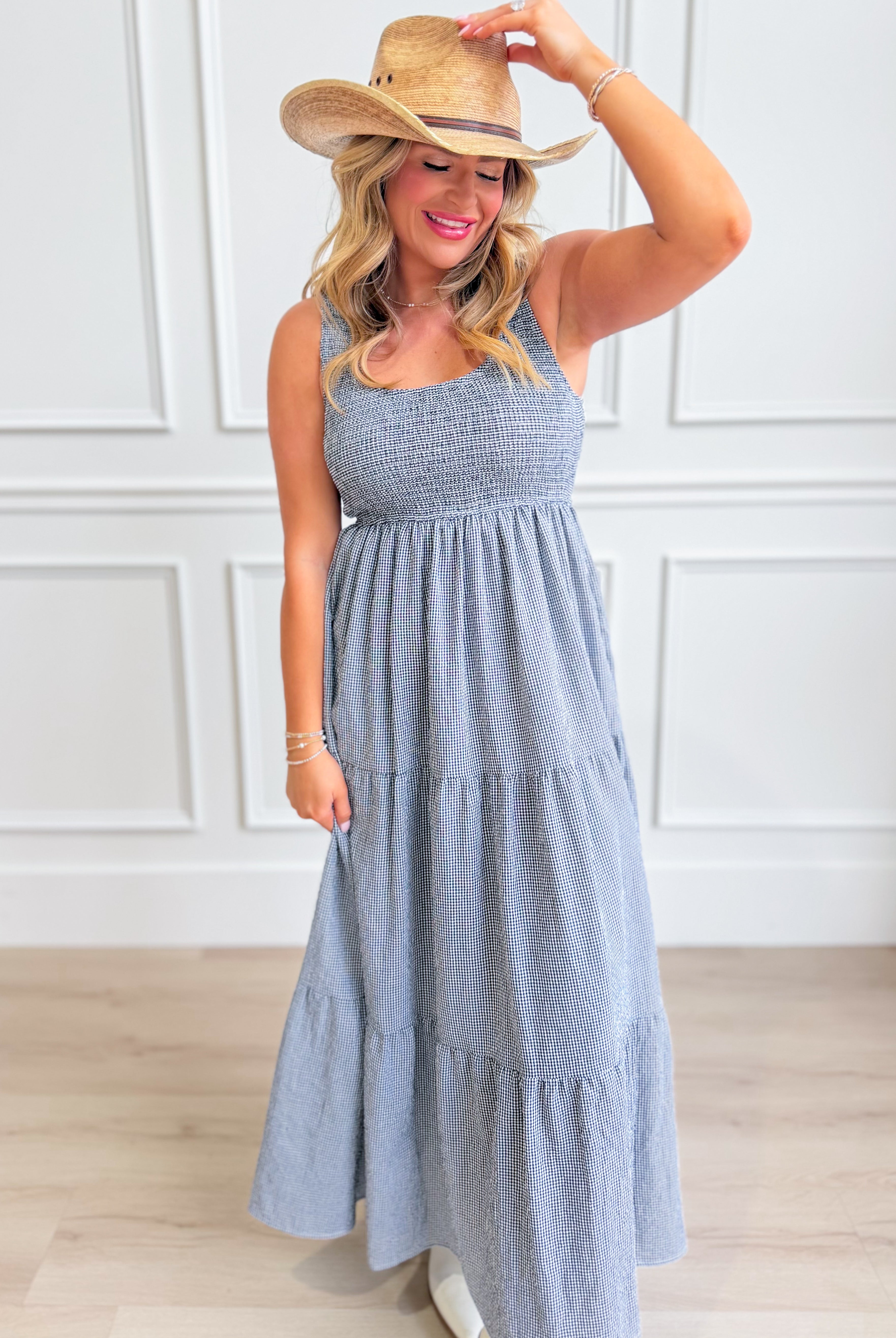 Baevely Painter Gingham Midi Dress with short sleeves and a fitted waist, featuring a classic black and white checkered pattern.