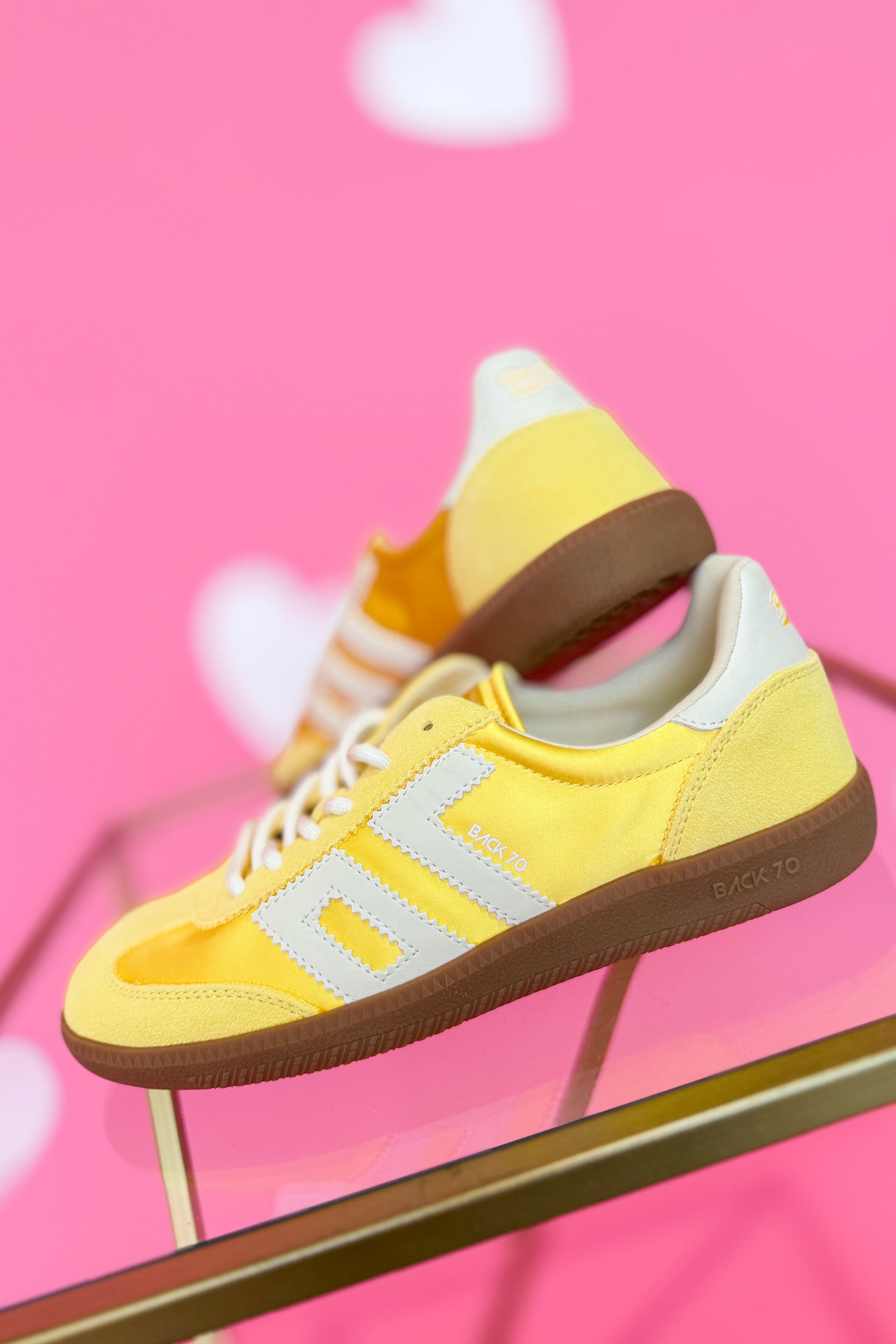 BACK 70 Ghost Sneakers in Banana color, 205 sneakers with a sleek design and vibrant yellow accents, displayed on a plain background.