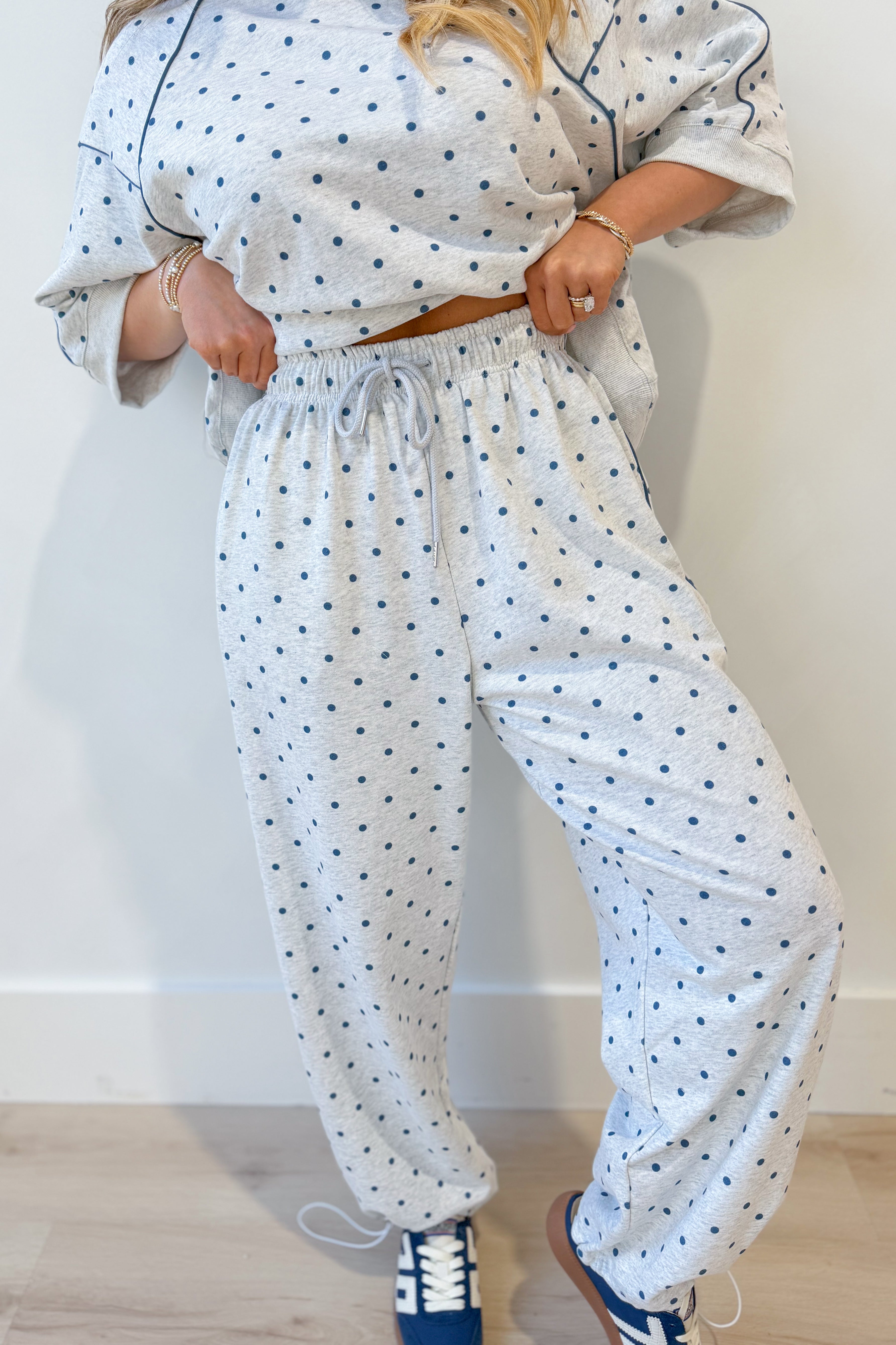 Frederick Grey Polka Dot French Terry Track Pant by PEACH LOVE, featuring a comfortable fit and stylish polka dot pattern.