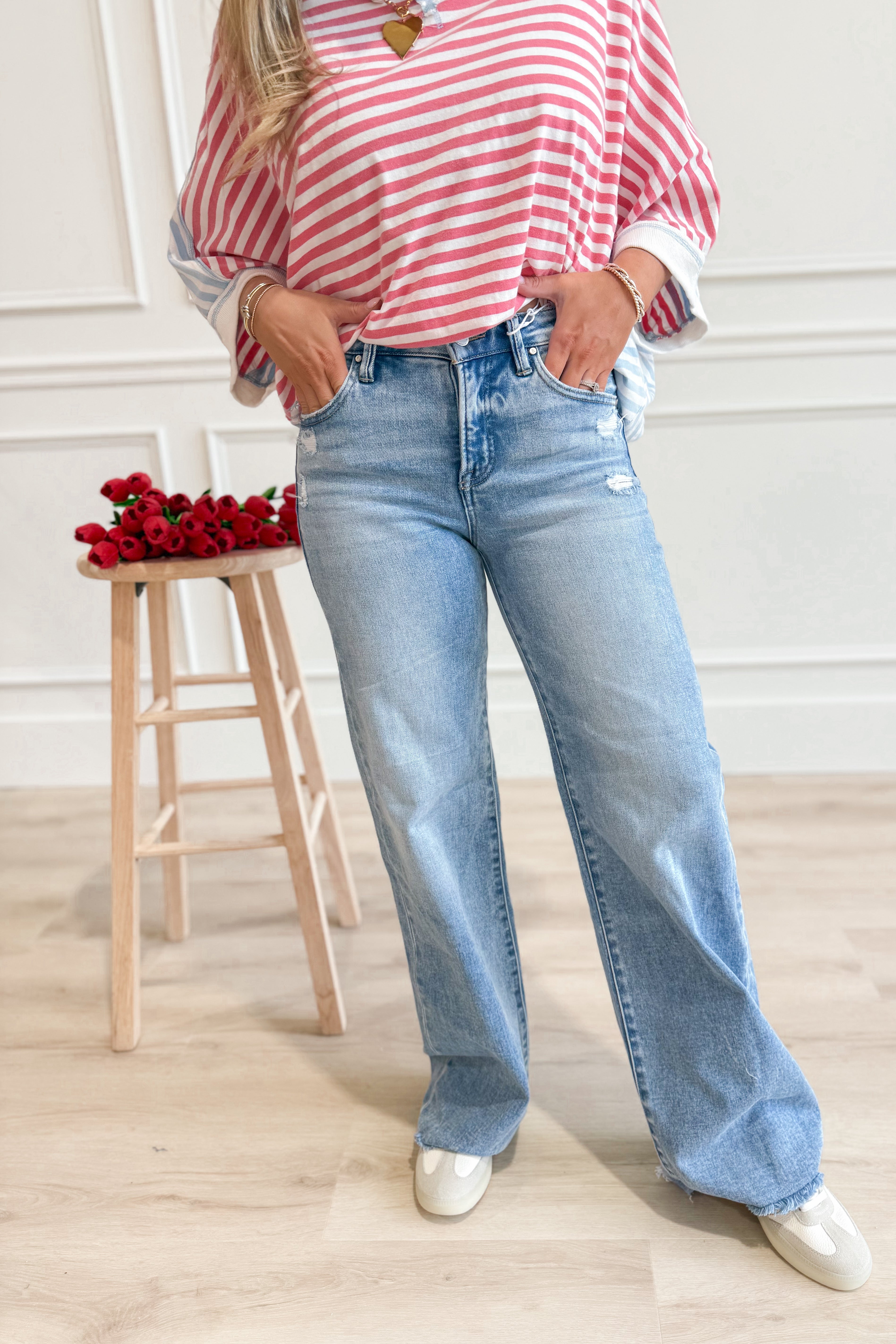 RISEN Derrick mid-rise tummy control wide-leg jeans, 146 Core style, showcasing the fit and style of the denim in natural lighting.