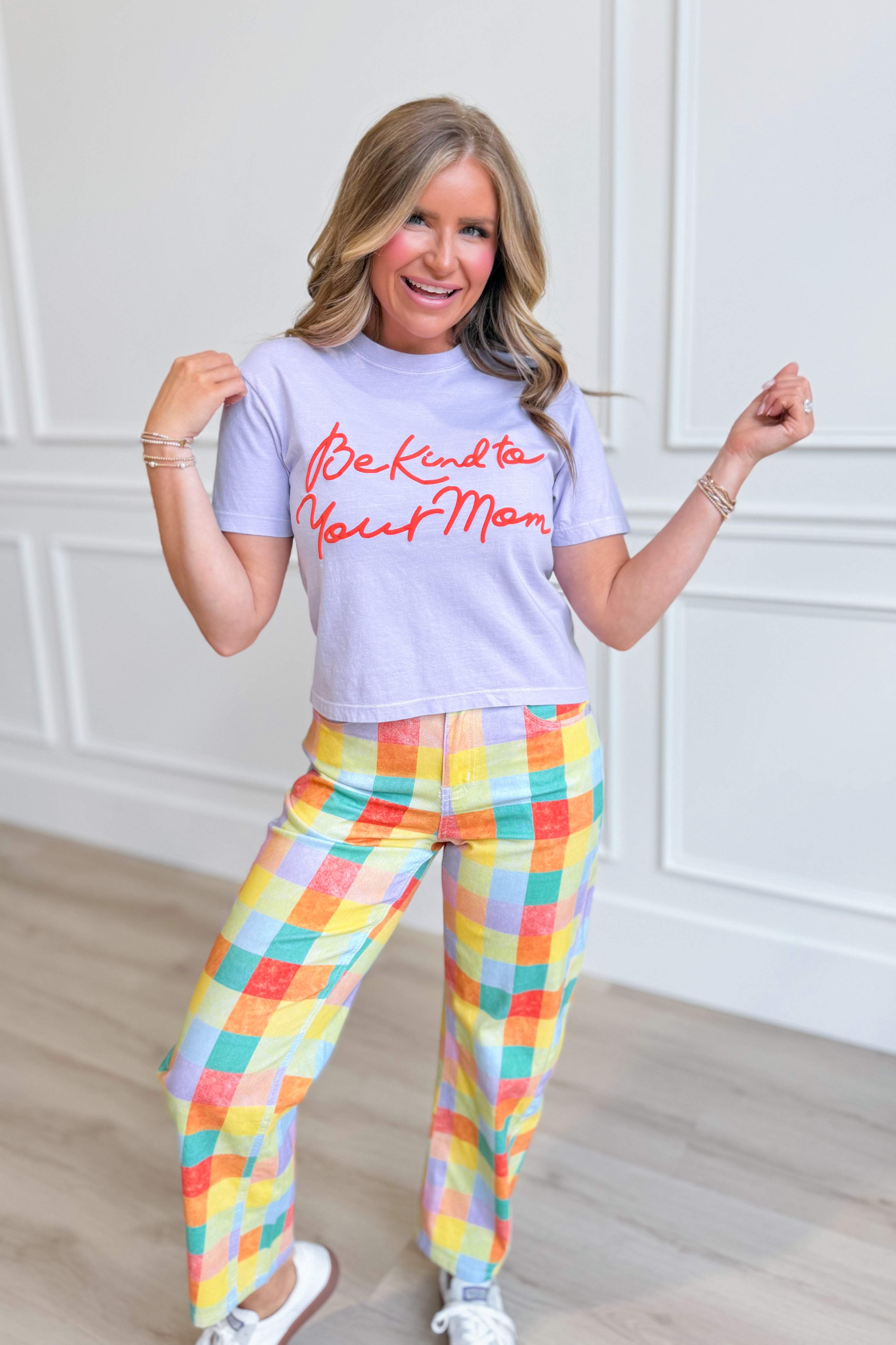 Pink crop tee with "Be Kind To Your Mom" graphic from POPPY & PINE's 117 Graphic Tees collection, casual and stylish for women.