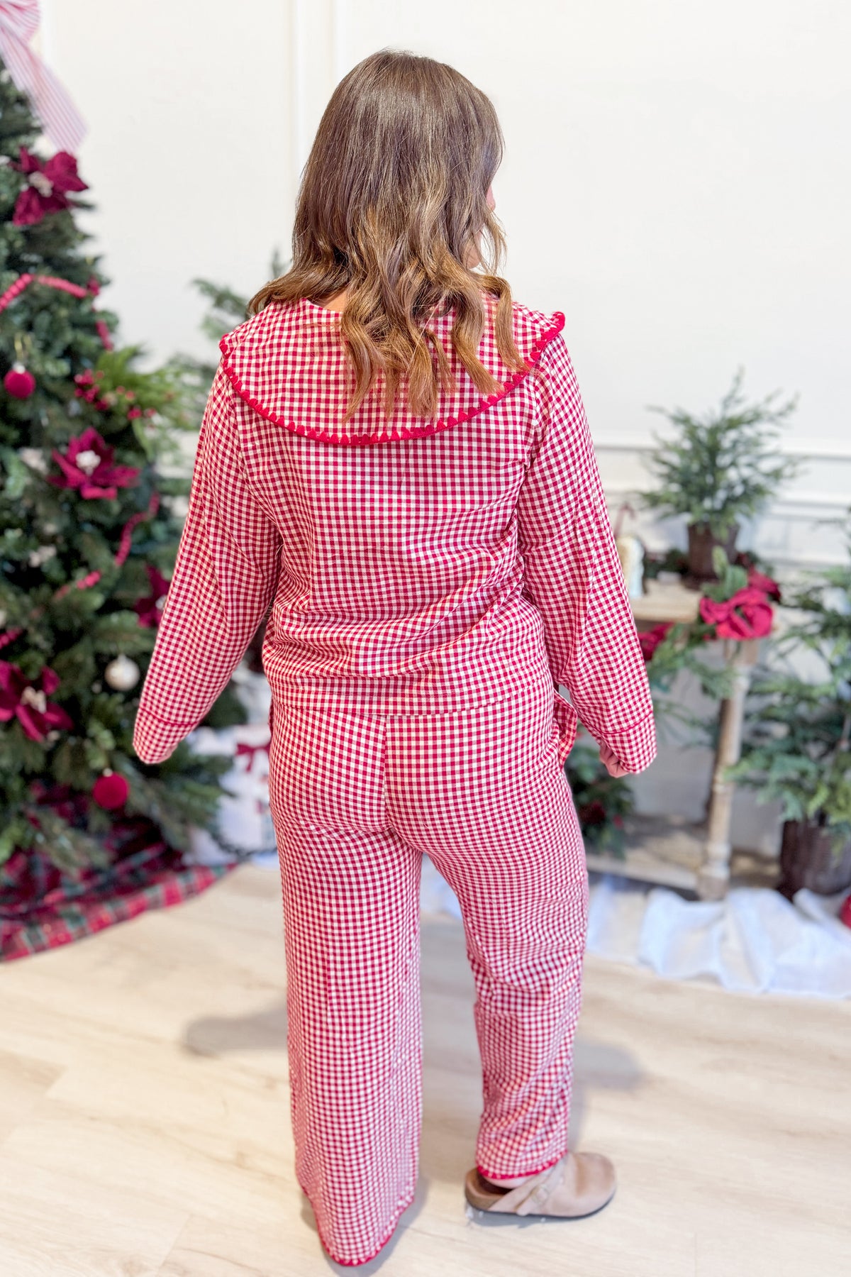 PEACH LOVE Nicholas Gingham Santa embroidered pajama pants with festive red and white pattern, relaxed fit, and elastic waistband.