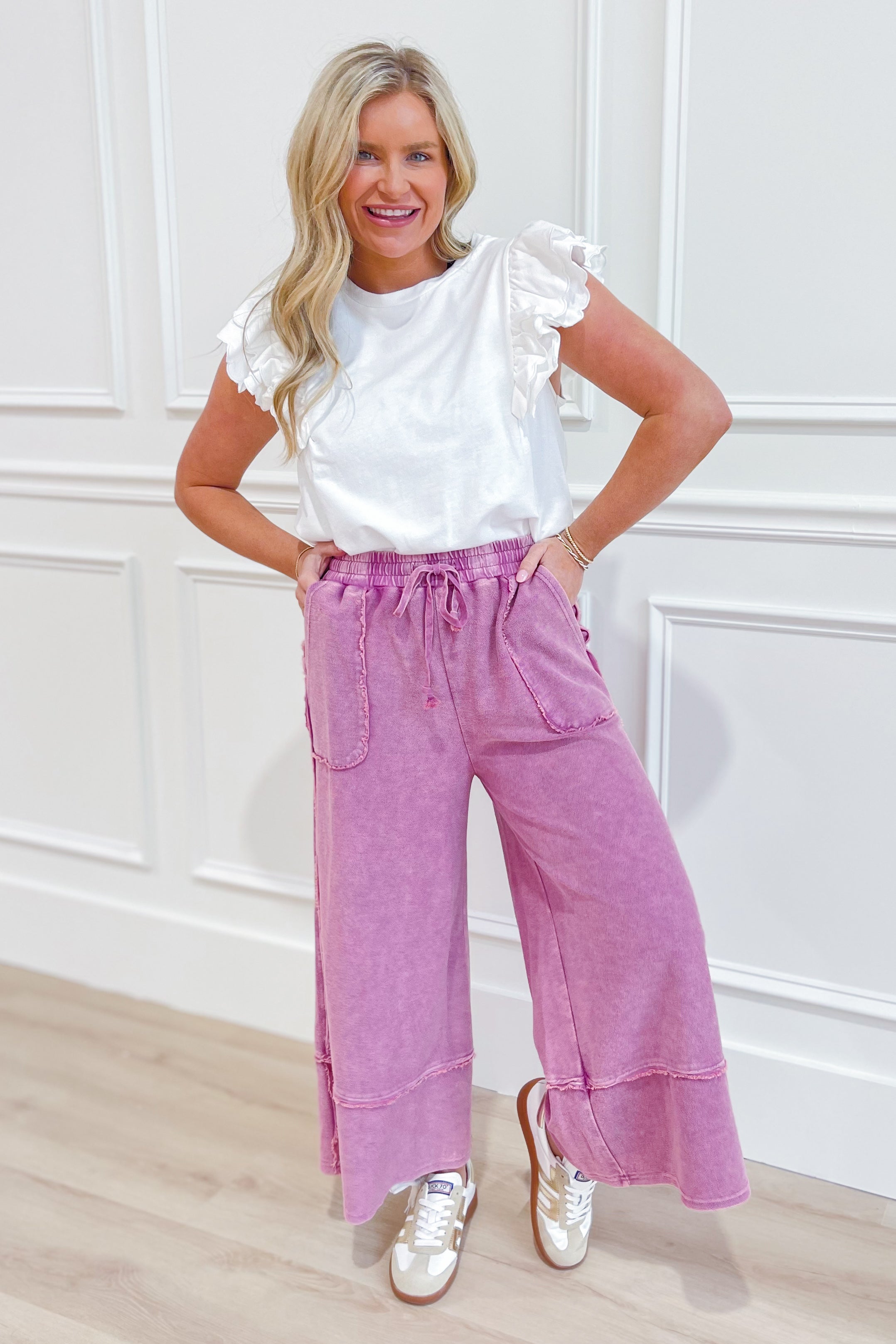 EASEL Caris Mineral Washed Upside Down Terry Knit Wide Leg Palazzo Pants in various sizes, shown hanging with relaxed fit.