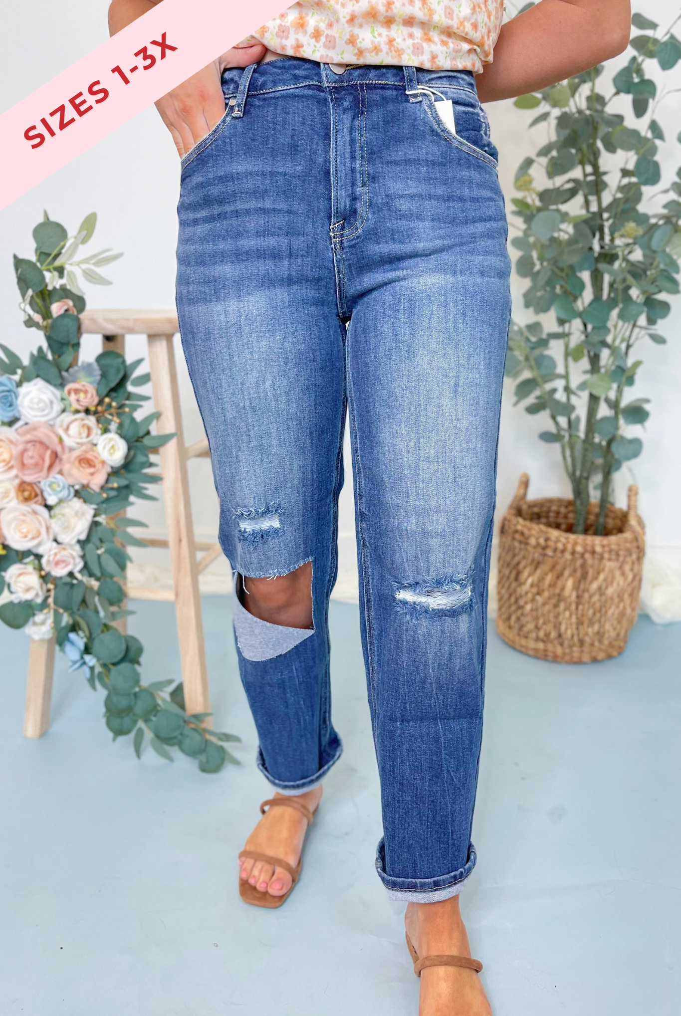 Risen Kendra high-rise distressed relaxed fit 146 core jeans with ripped details and faded wash, front view.