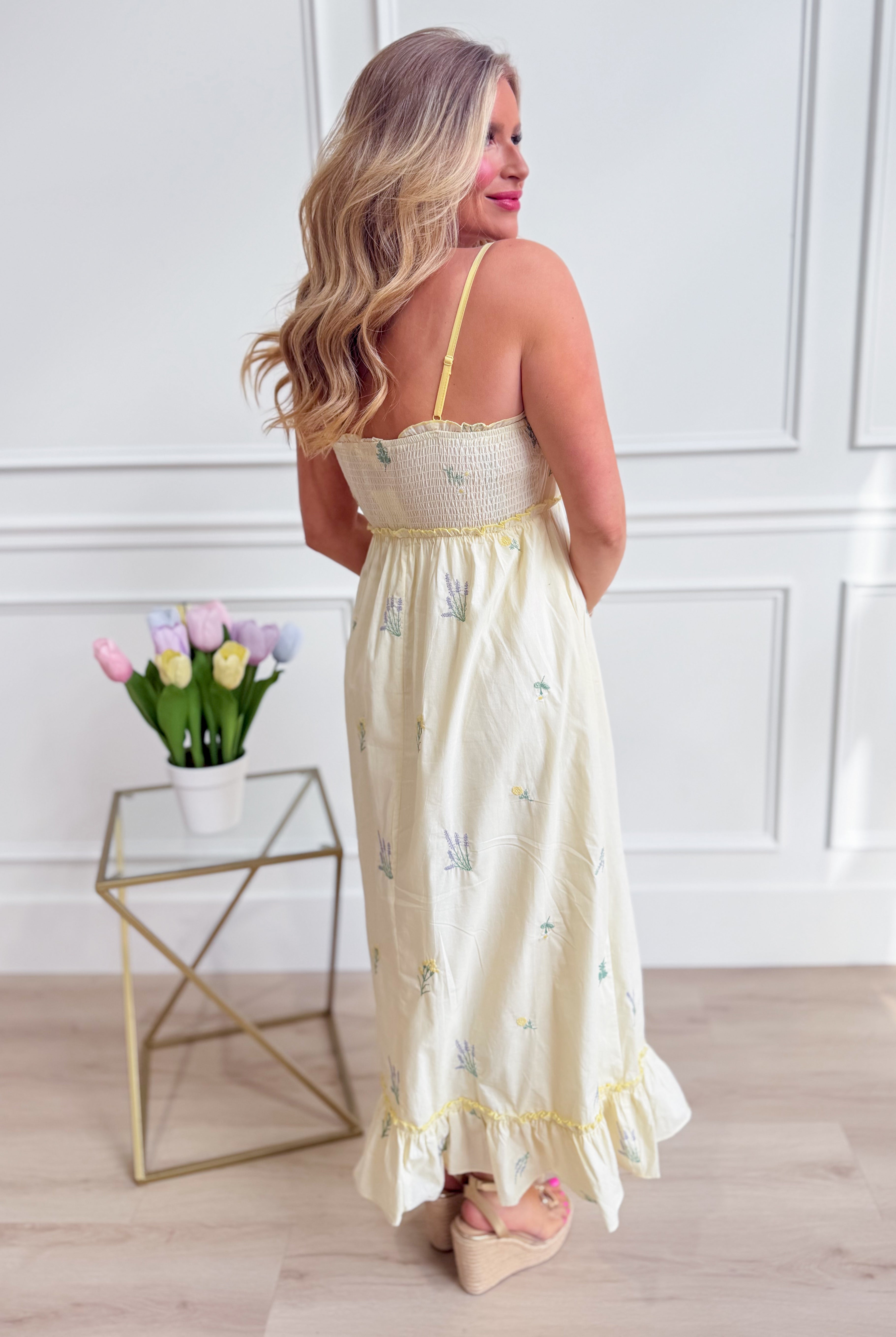 WISHLIST Avery triple bow floral midi dress featuring a flowy silhouette and vibrant floral pattern, perfect for dressy occasions.