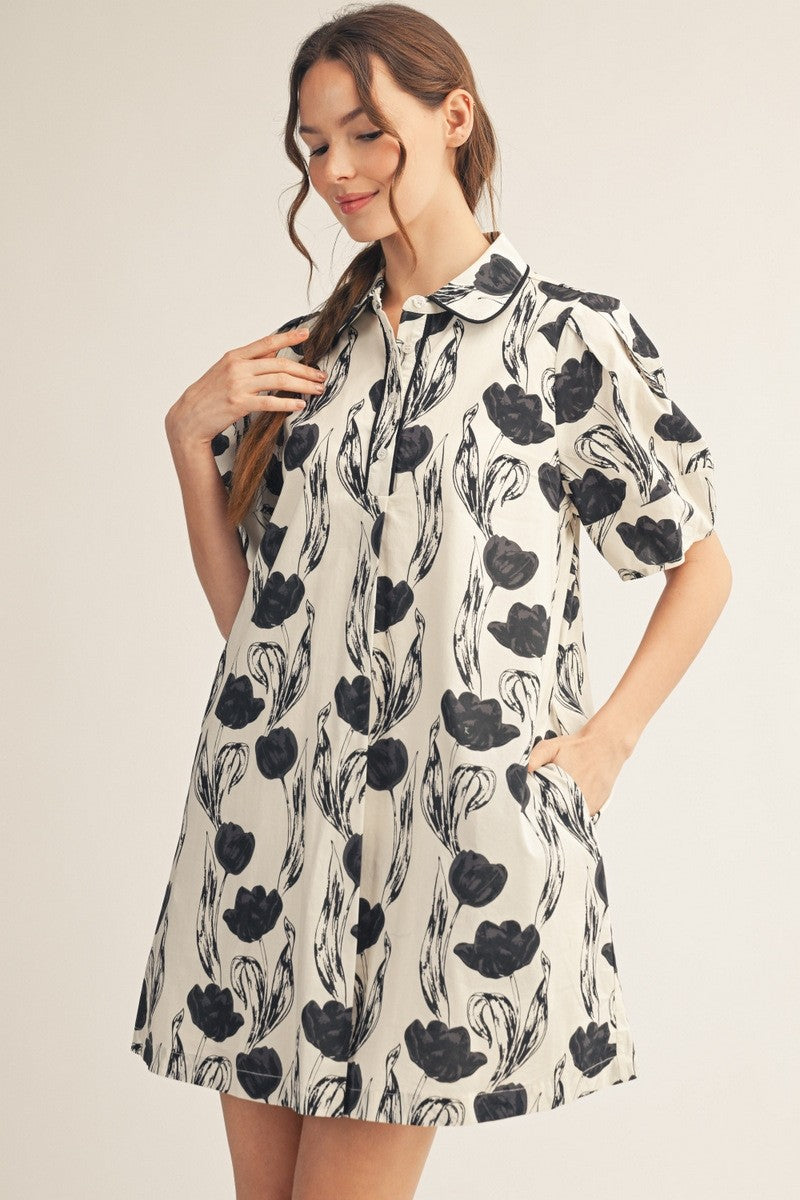 JODIFL Karen floral abstract dress with colorful print, sleeveless design, and elegant fit for dressy occasions.