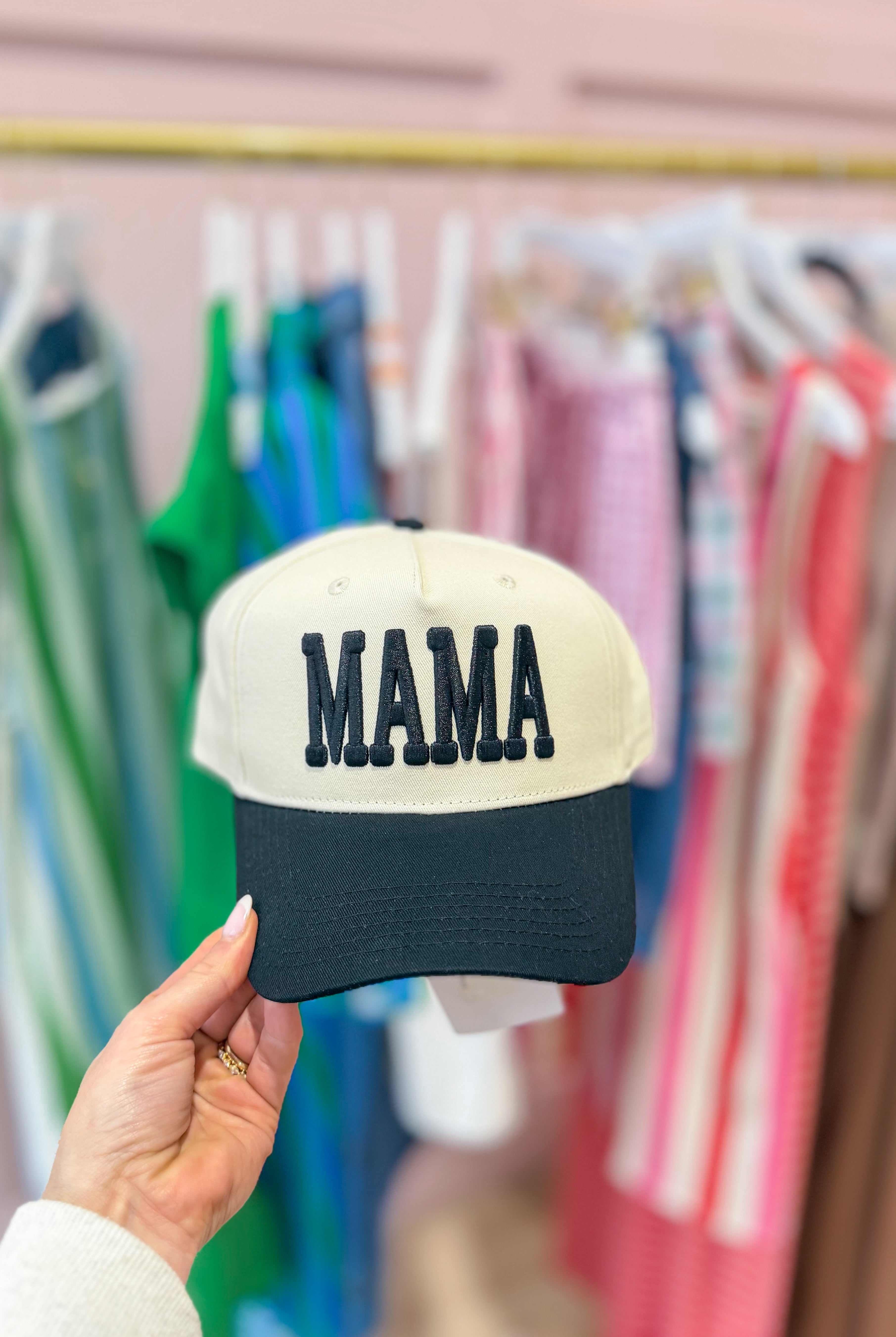 ETTA & EAST Mama Cream and Black Puff Trucker Hat with adjustable strap and mesh back, stylish and comfortable for casual wear.