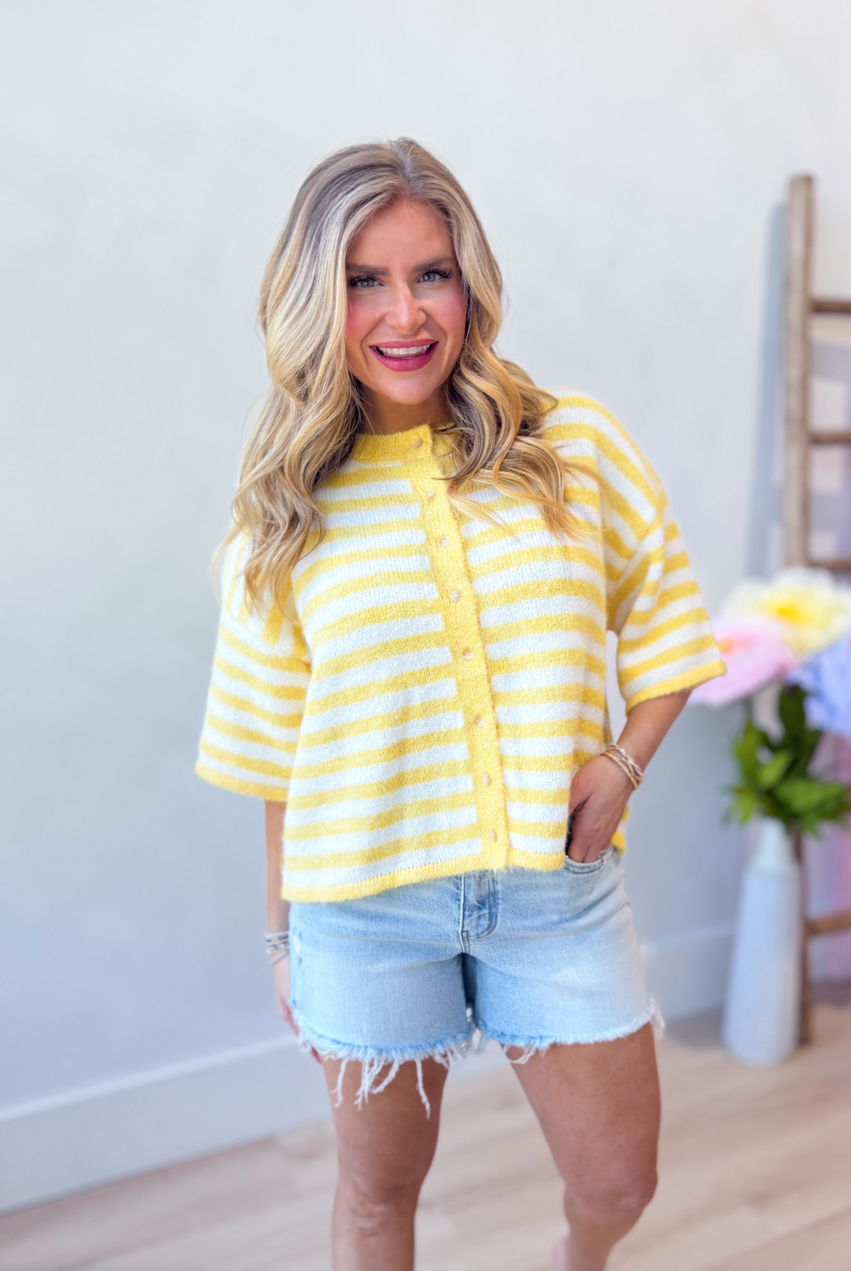 Lauren yellow striped button-down cardigan top from BAEVELY, 131 spring sweater, with yellow and white stripes and front buttons.