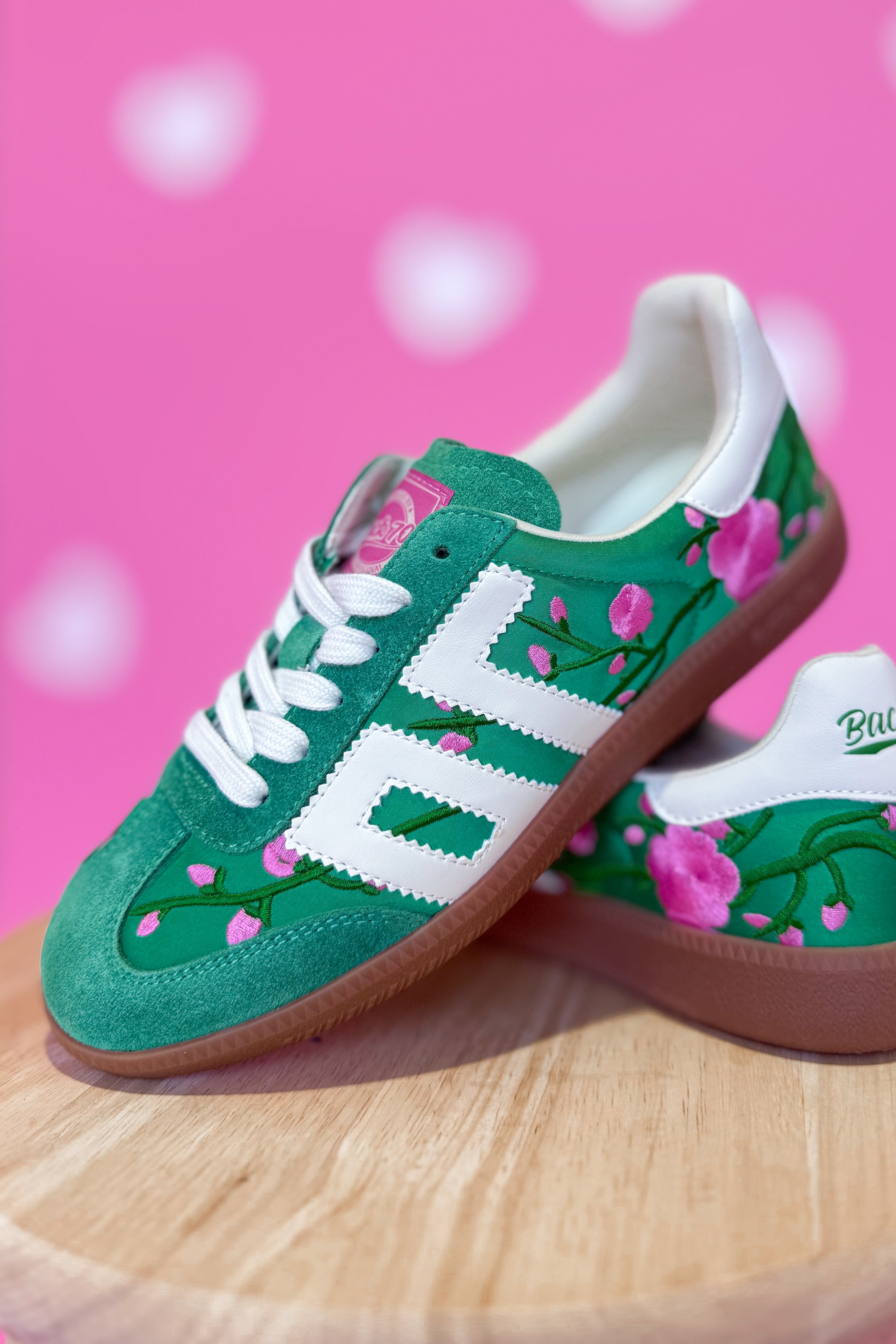 Green floral ghost design on BACK70 Ghost Sneakers 205 by BACK 70, showcasing stylish sneaker with floral pattern detail.