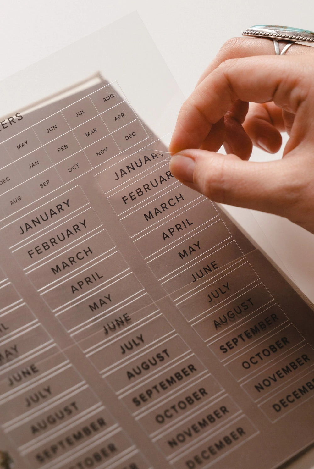Undated 12-month planner by HOSANNA REVIVAL featuring a sleek design, perfect for organizing your year.