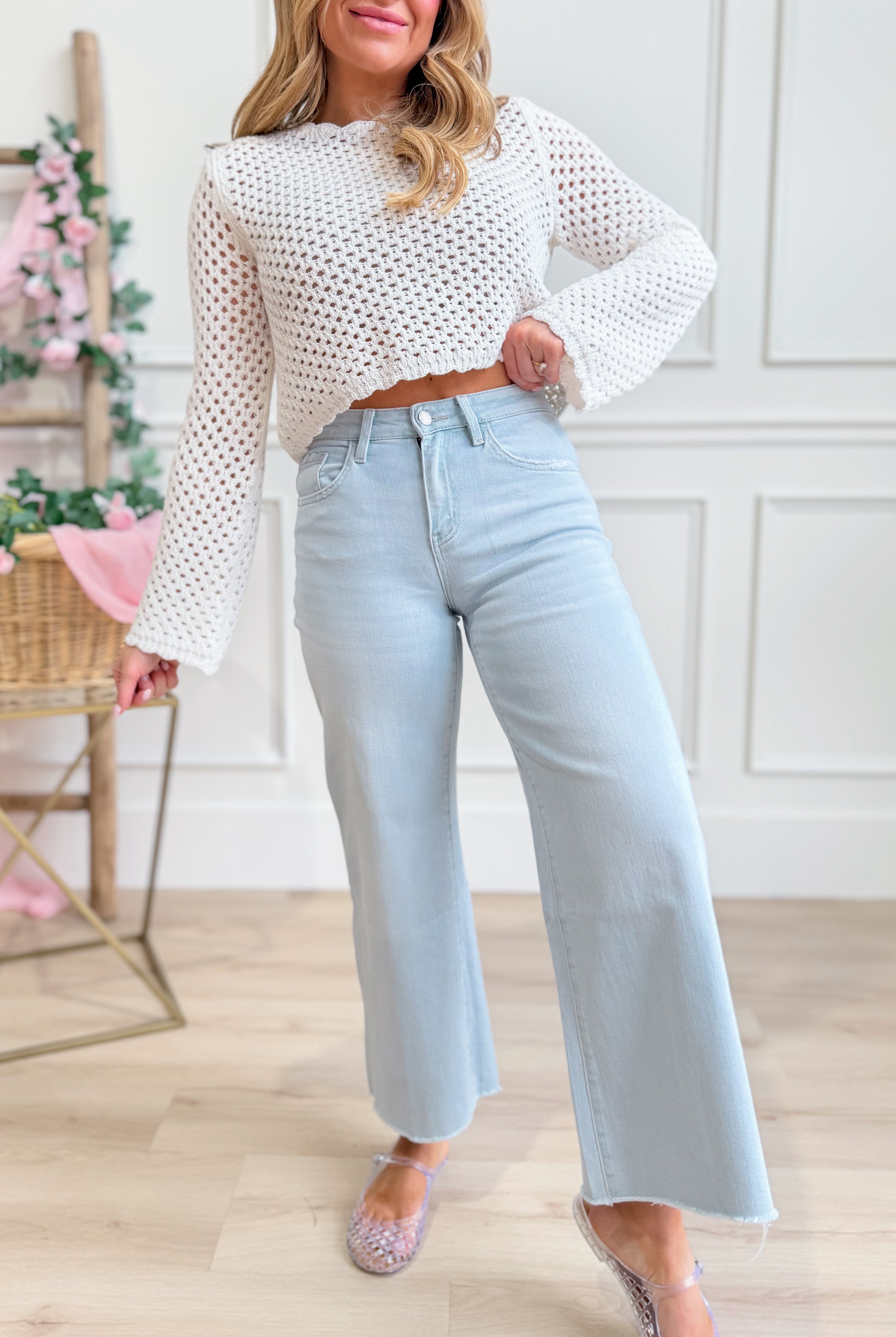 Vervet Olivia high-rise wide-leg jeans in light blue denim, showcasing relaxed fit and classic five-pocket style.