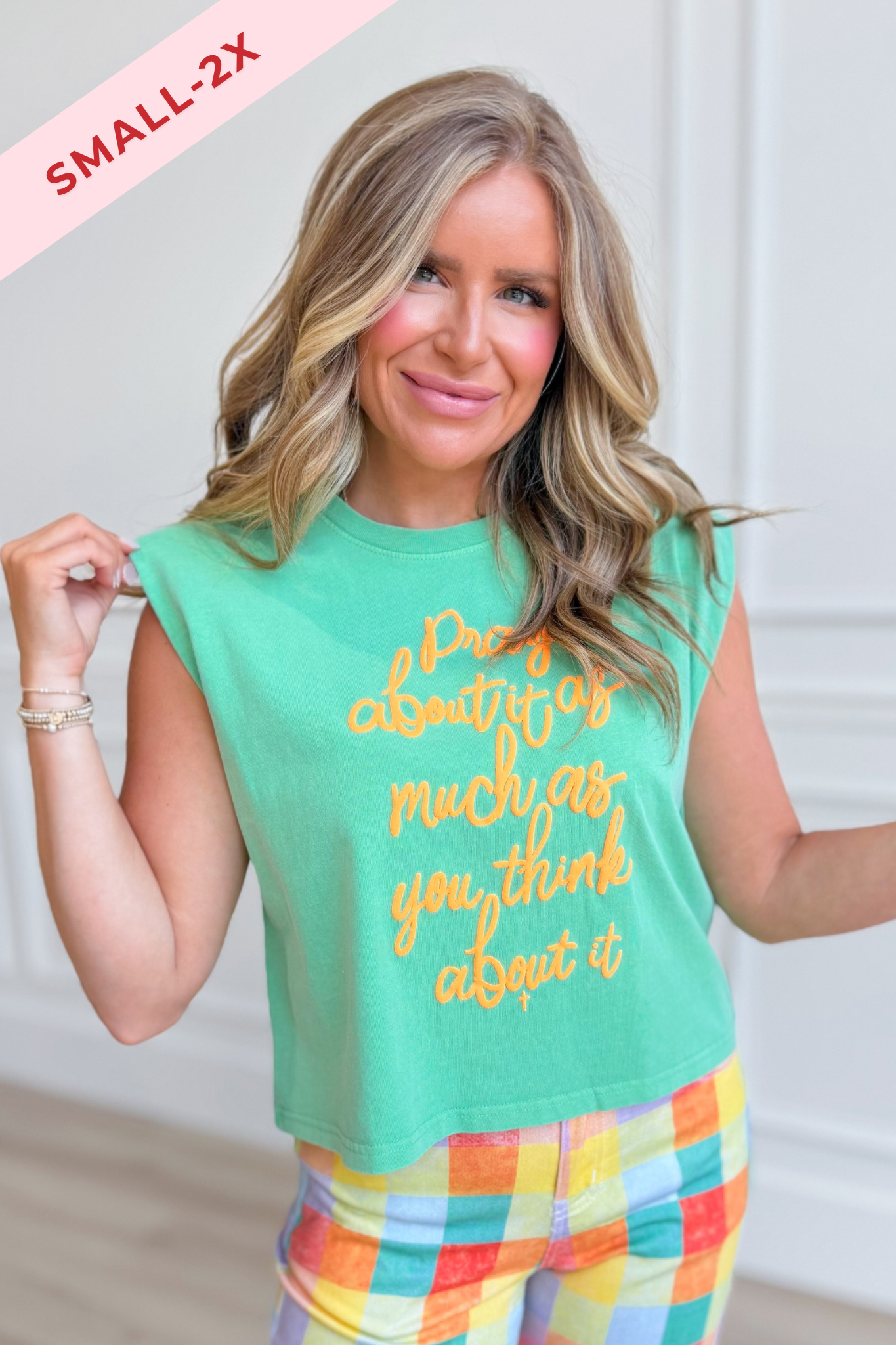 Black Pray About It tank top from POPPY & PINE's 117 Graphic Tees collection, featuring a bold printed message on soft fabric.