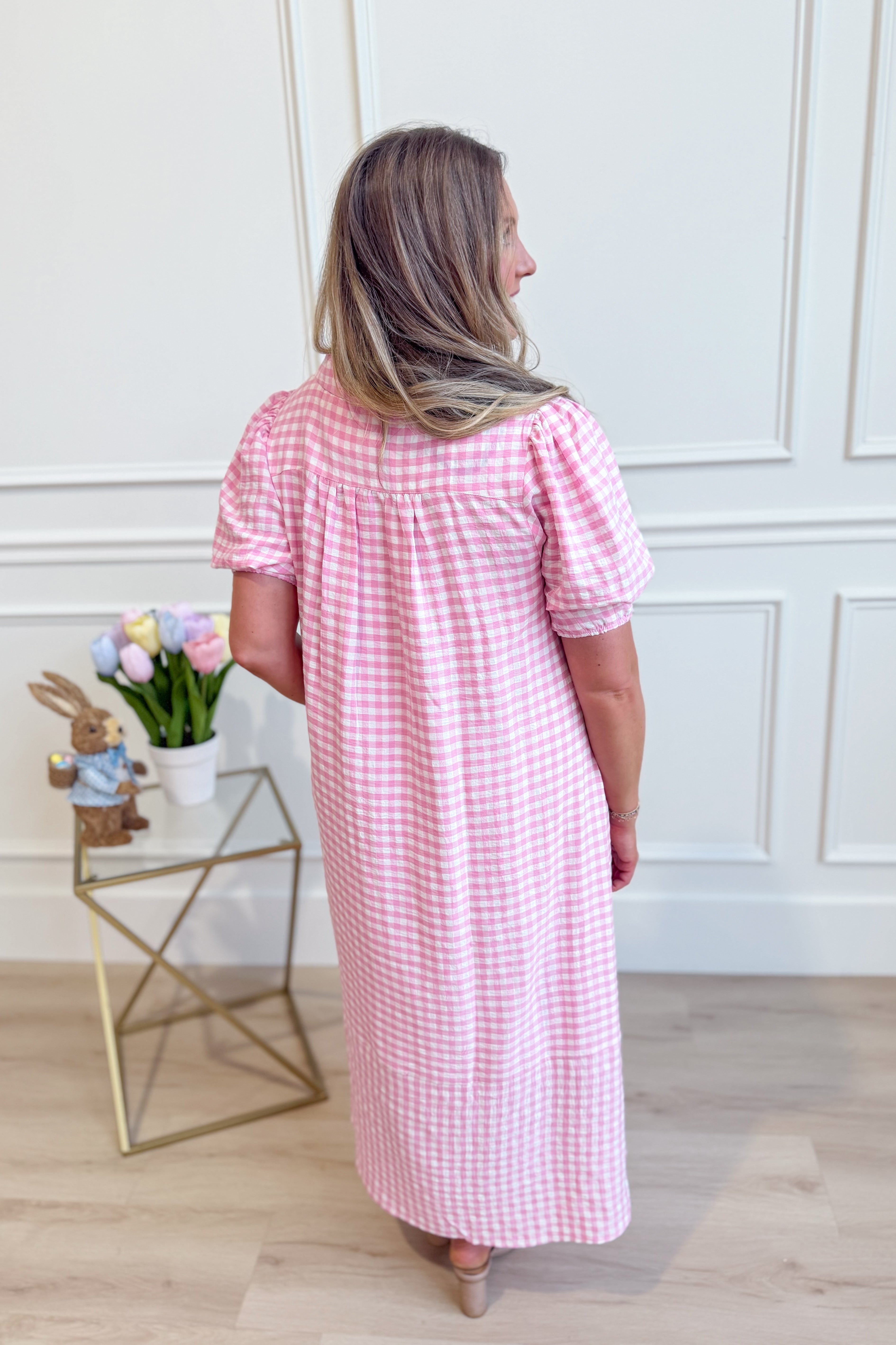 Umgée USA Tonya plaid printed midi dress with long sleeves and a fitted waist, featuring a stylish plaid pattern and elegant design.