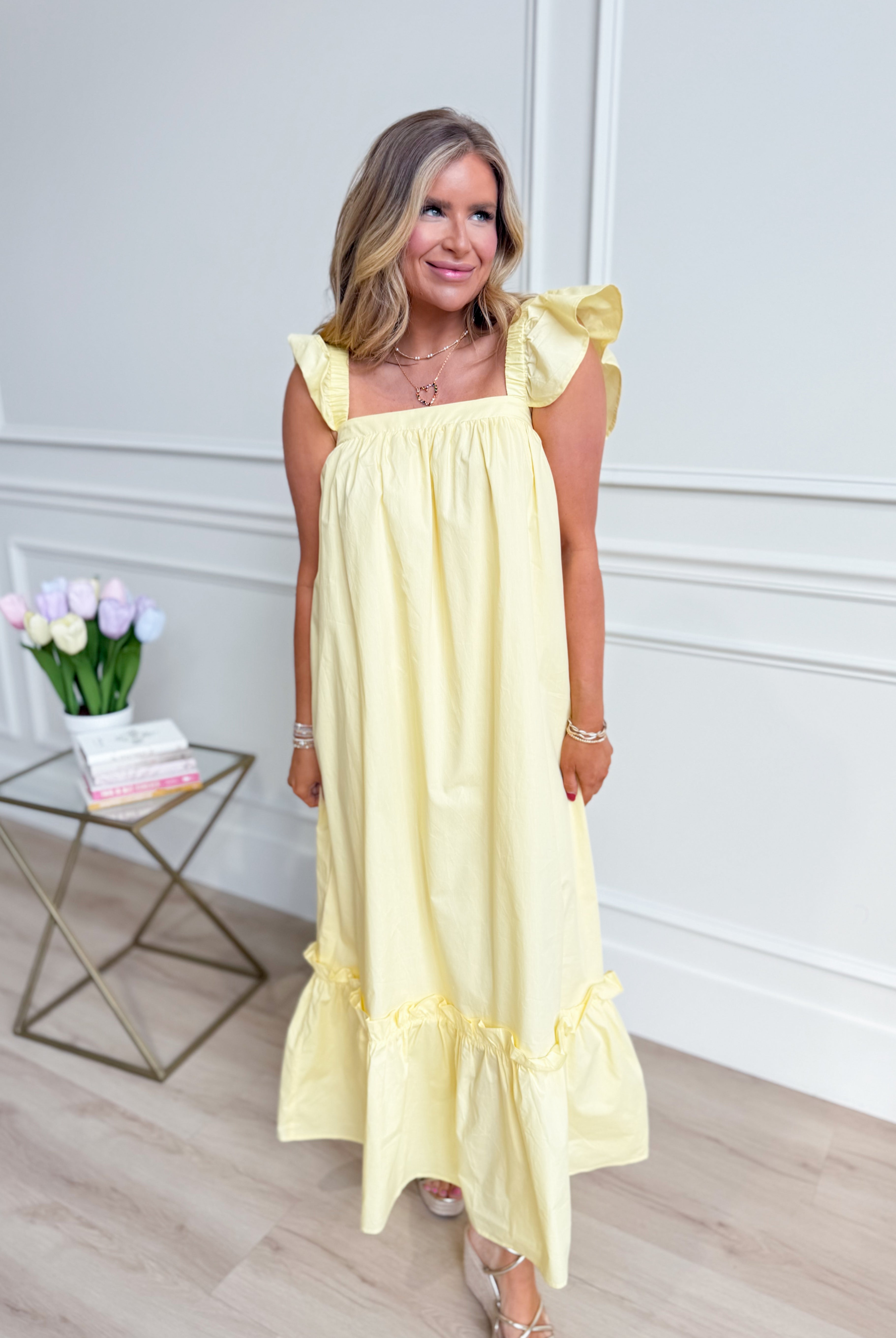 TCEC Folly Butter Flutter Sleeve Midi Dress, casual style with flutter sleeves and a midi length, shown on a model.