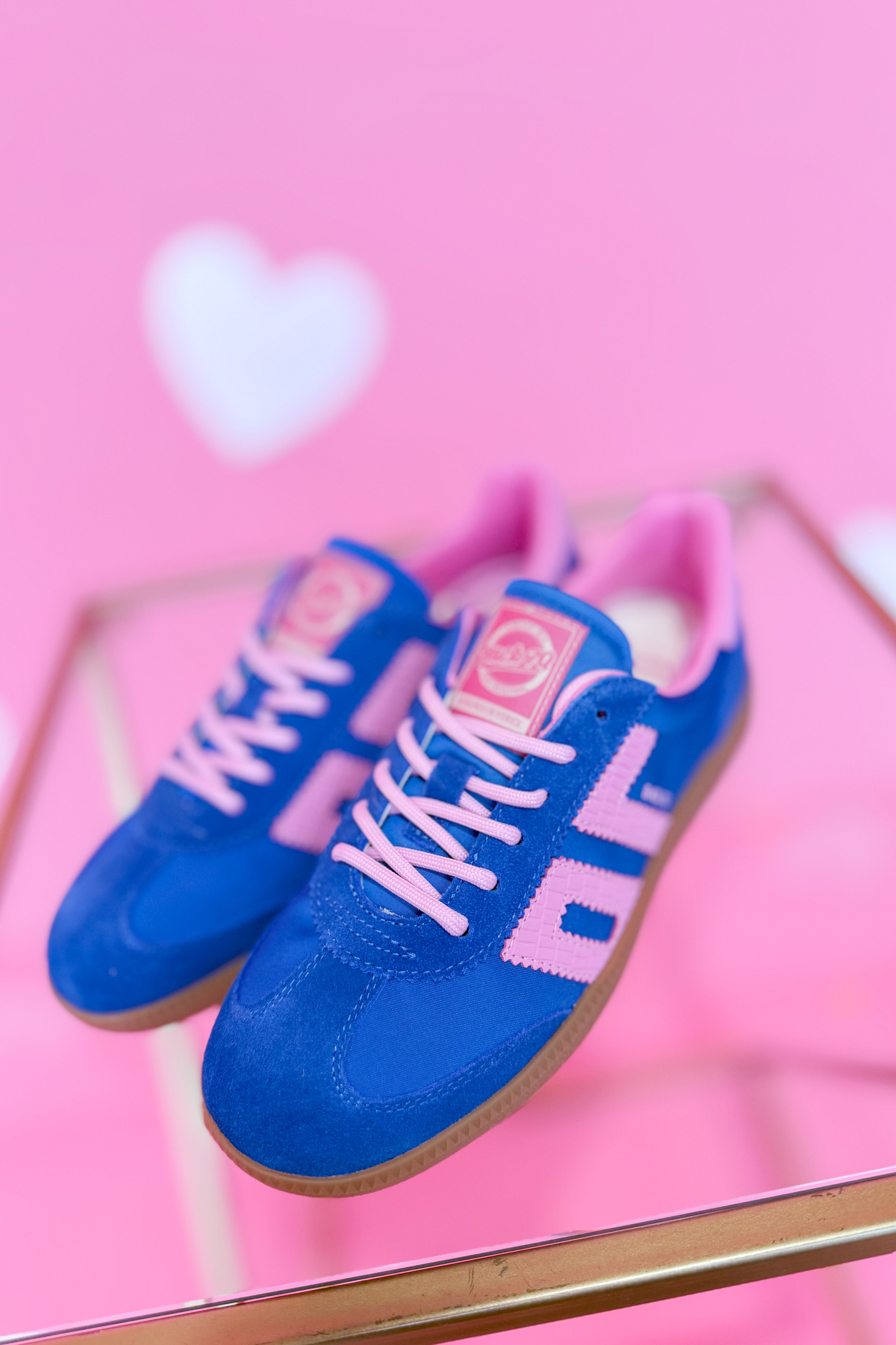 BACK70 Ghost Sneakers in blue and pink with a sleek 205 sneaker design, featuring modern athletic style and vibrant color accents.