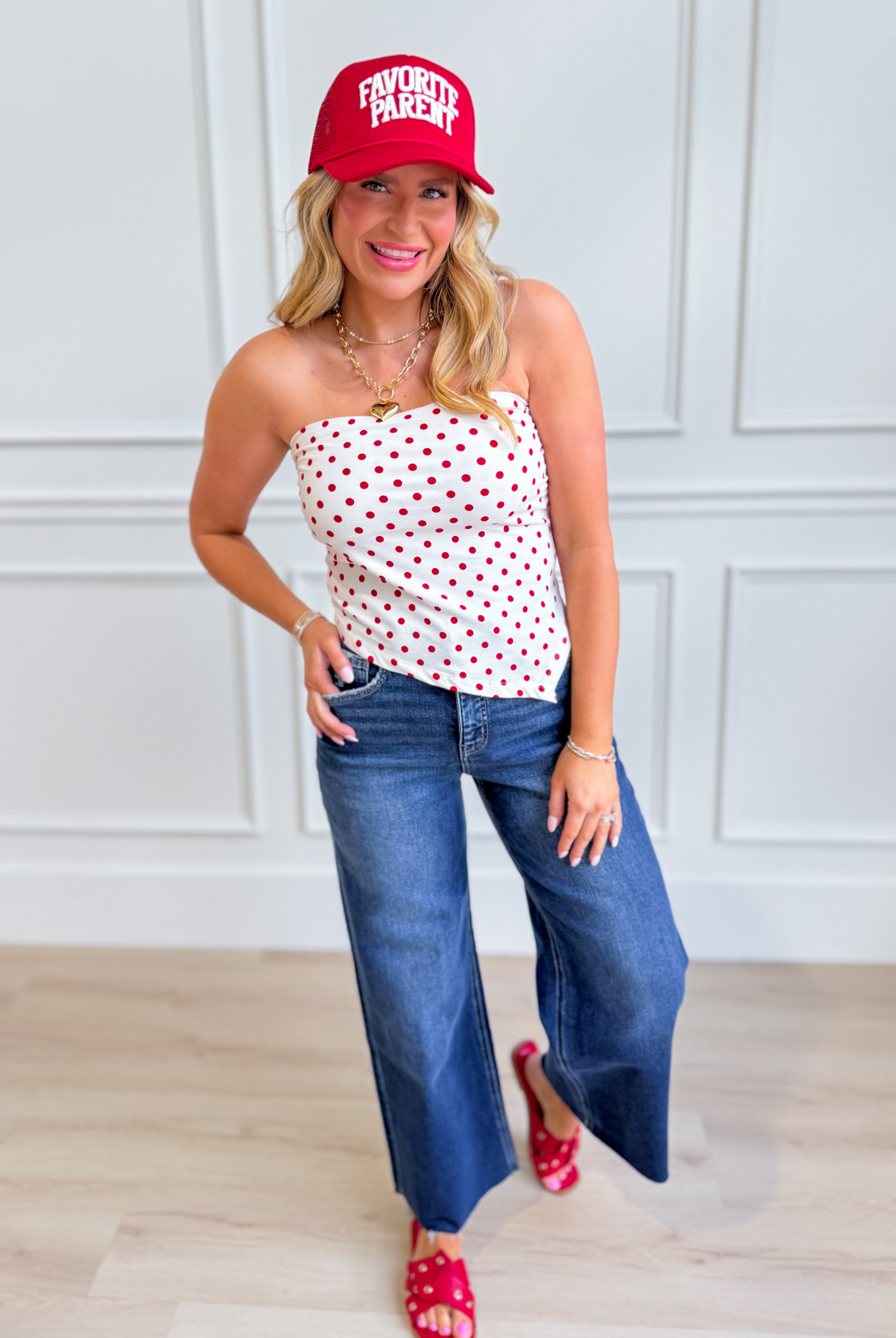 White polka dot triangle tube top by HYFVE, ideal for dressy occasions, featuring a stylish and trendy design.