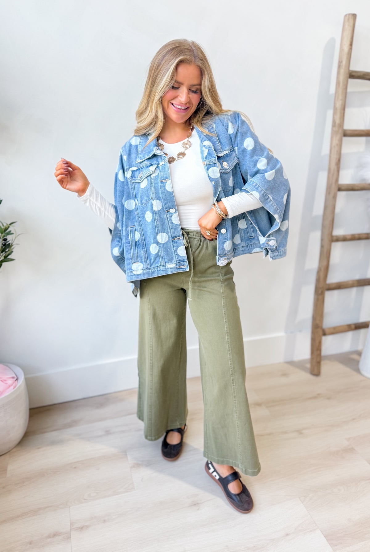 TWENTIFOURTH Otis Polka Dot Cape Button Down Jacket, 140 Outerwear with polka dot pattern and button details, shown on a hanger.