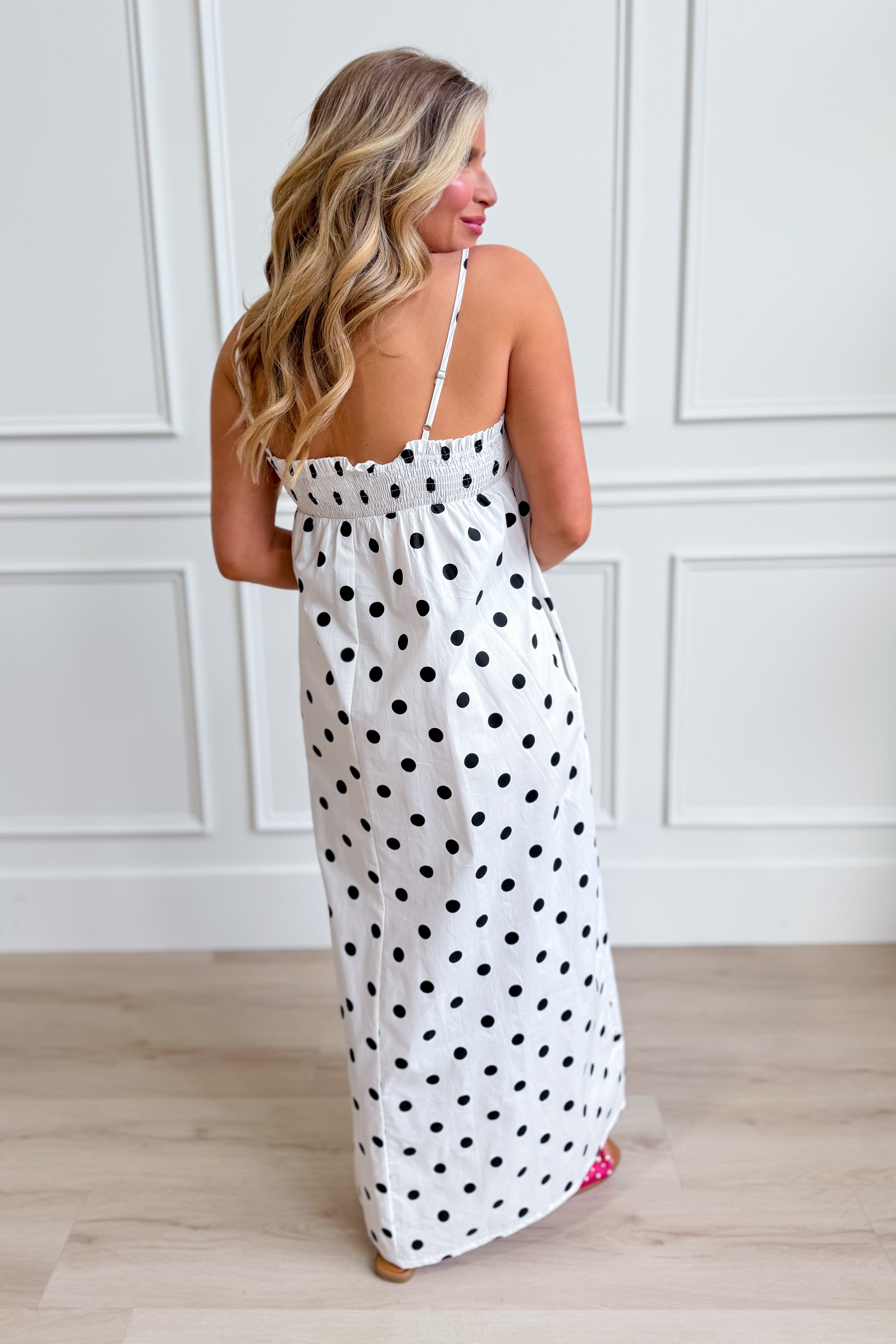 Laney Polka Dot Maxi Dress by THINGS BETWEEN, featuring a flowy silhouette and stylish polka dot pattern, perfect for dressy occasions.