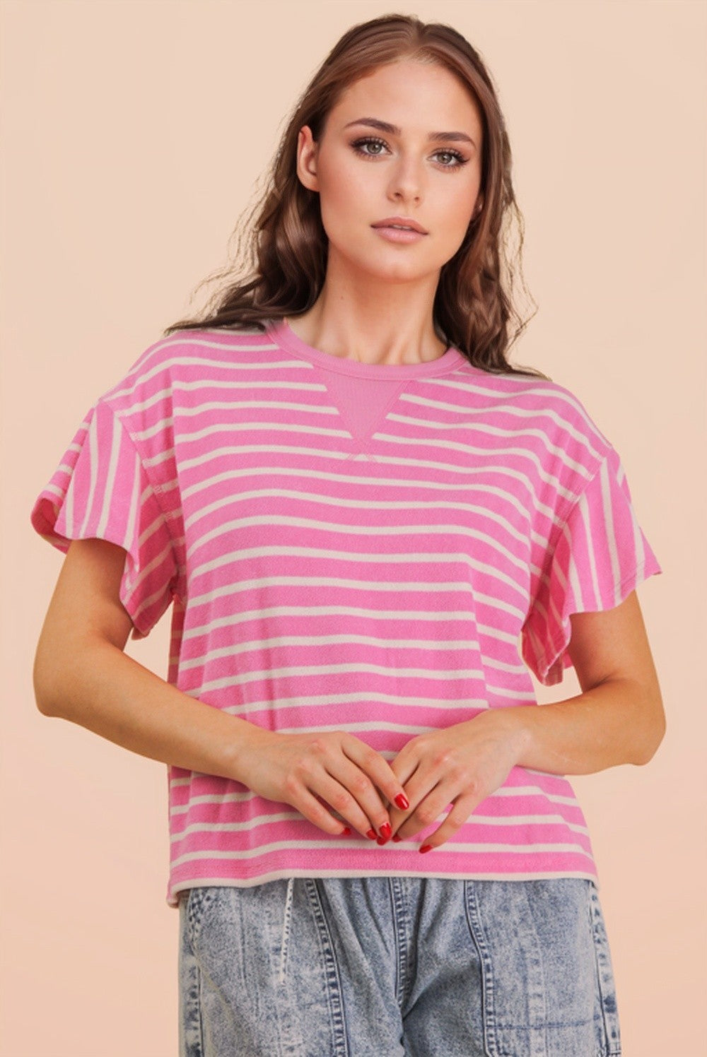 Pamela Pink Ruffle Sleeve Top by VERY J, casual women's top with ruffled sleeves and soft fabric, shown on a hanger.