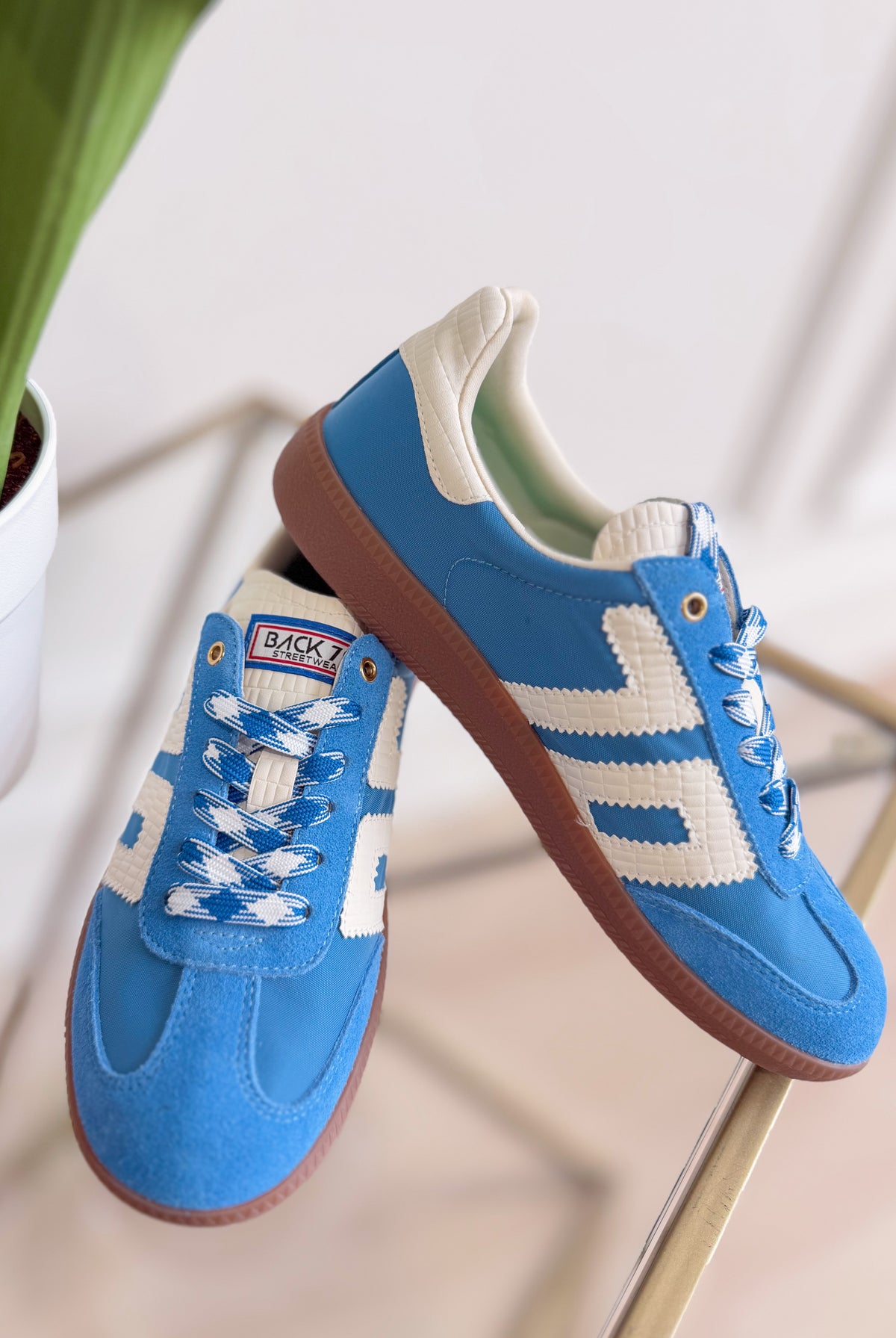 BACK 70 Ghost Sneakers in Blue Milk, 205 sneakers with a sleek design and blue and white color scheme.