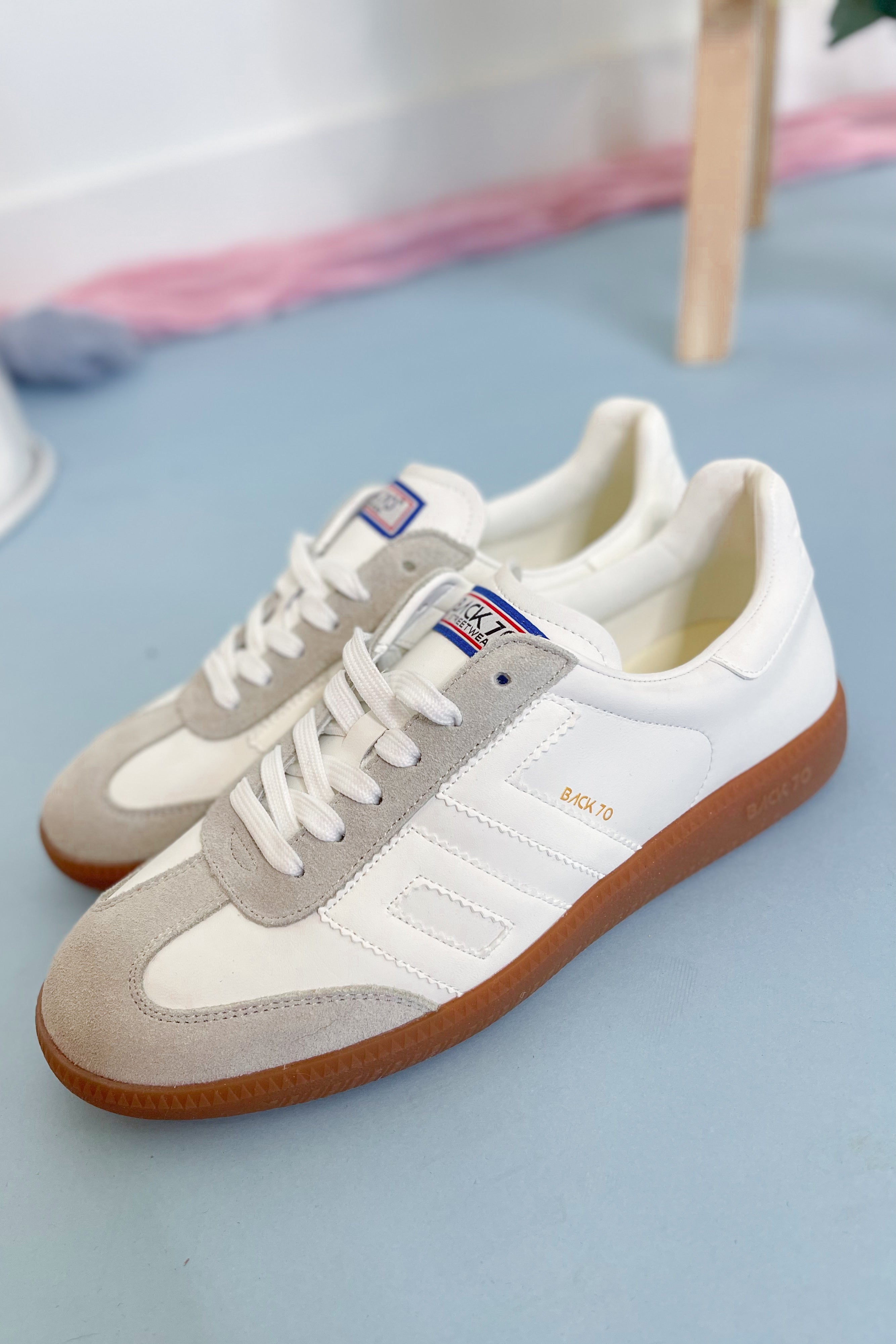 White Ice BACK70 Cloud Sneakers, model 205, featuring a sleek design and comfortable fit, showcased on a plain background.