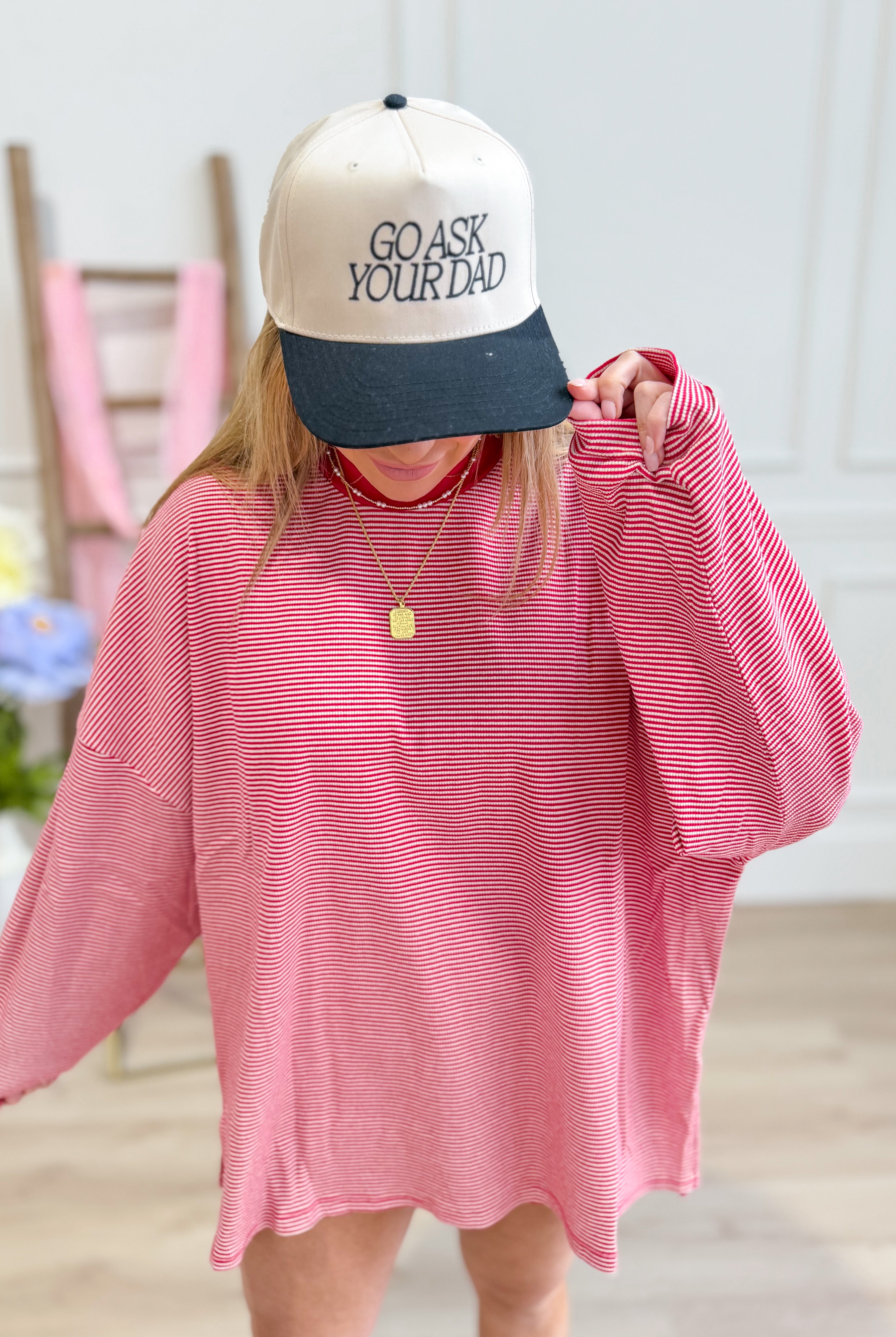 ETTA & EAST Go Ask Your Dad trucker hat with mesh back and adjustable snap closure, featuring bold front lettering.