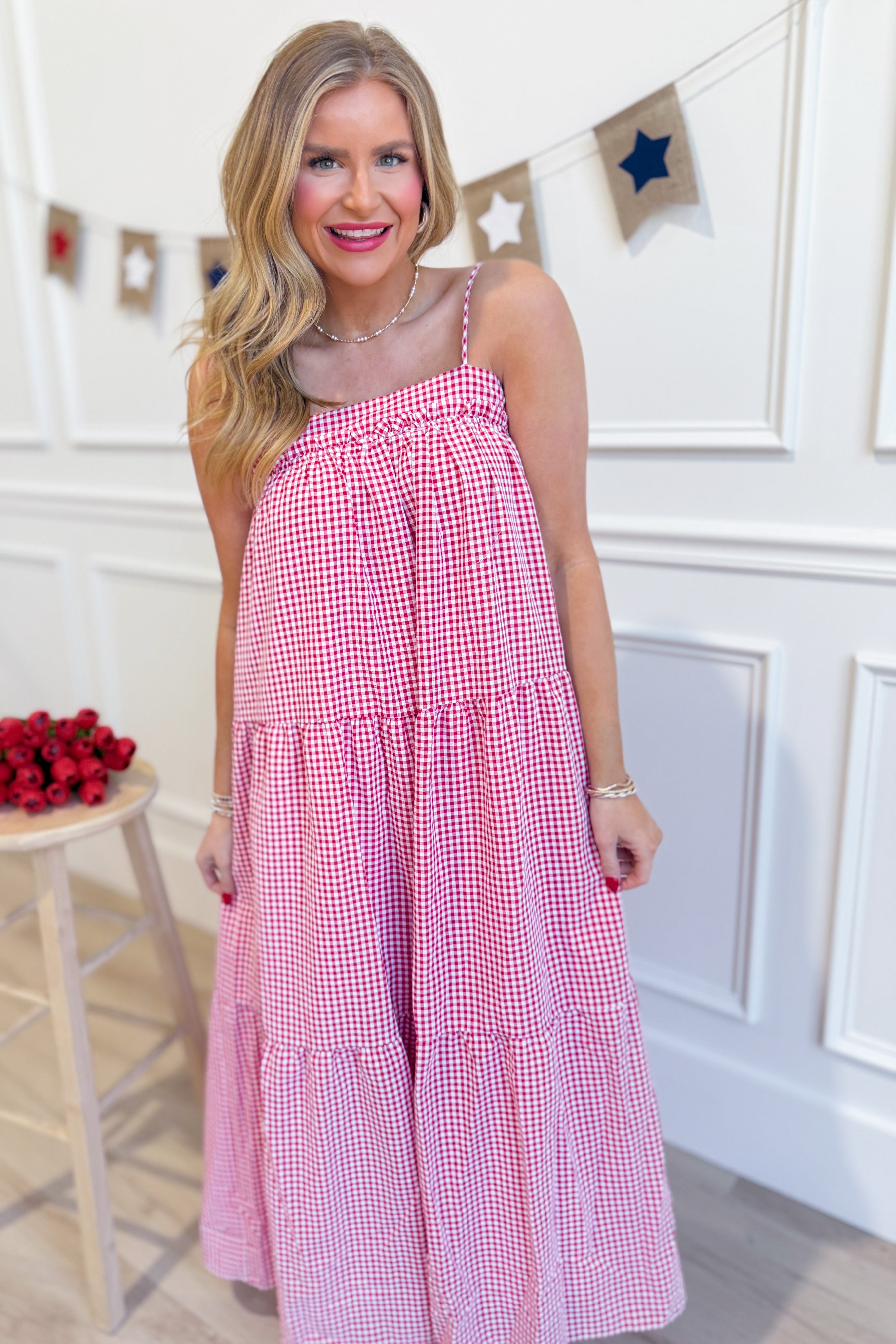 PEACH LOVE Sophie red gingham printed maxi dress with a flowy silhouette and sleeveless design, perfect for dressy occasions.