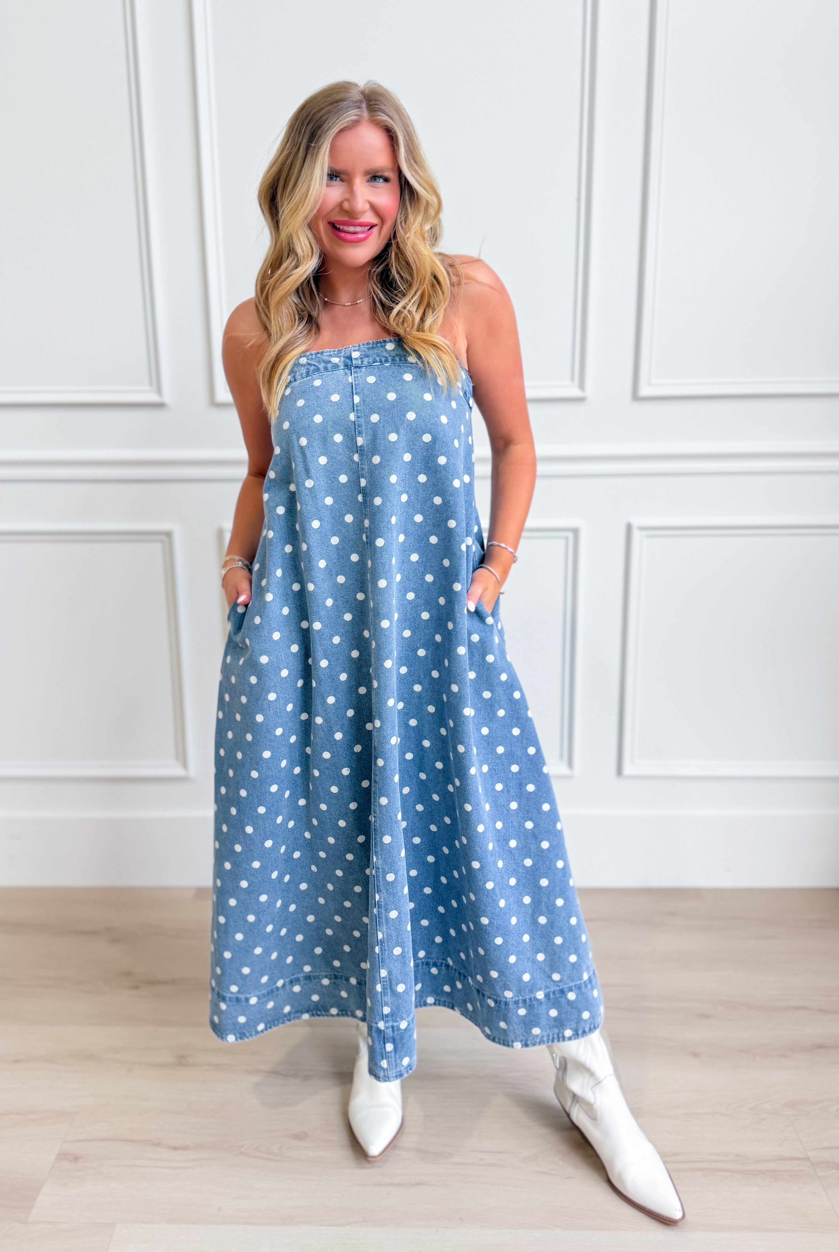 Aureum Mia polka dot denim dress with a fitted bodice and flared skirt, perfect for casual or dressy occasions.