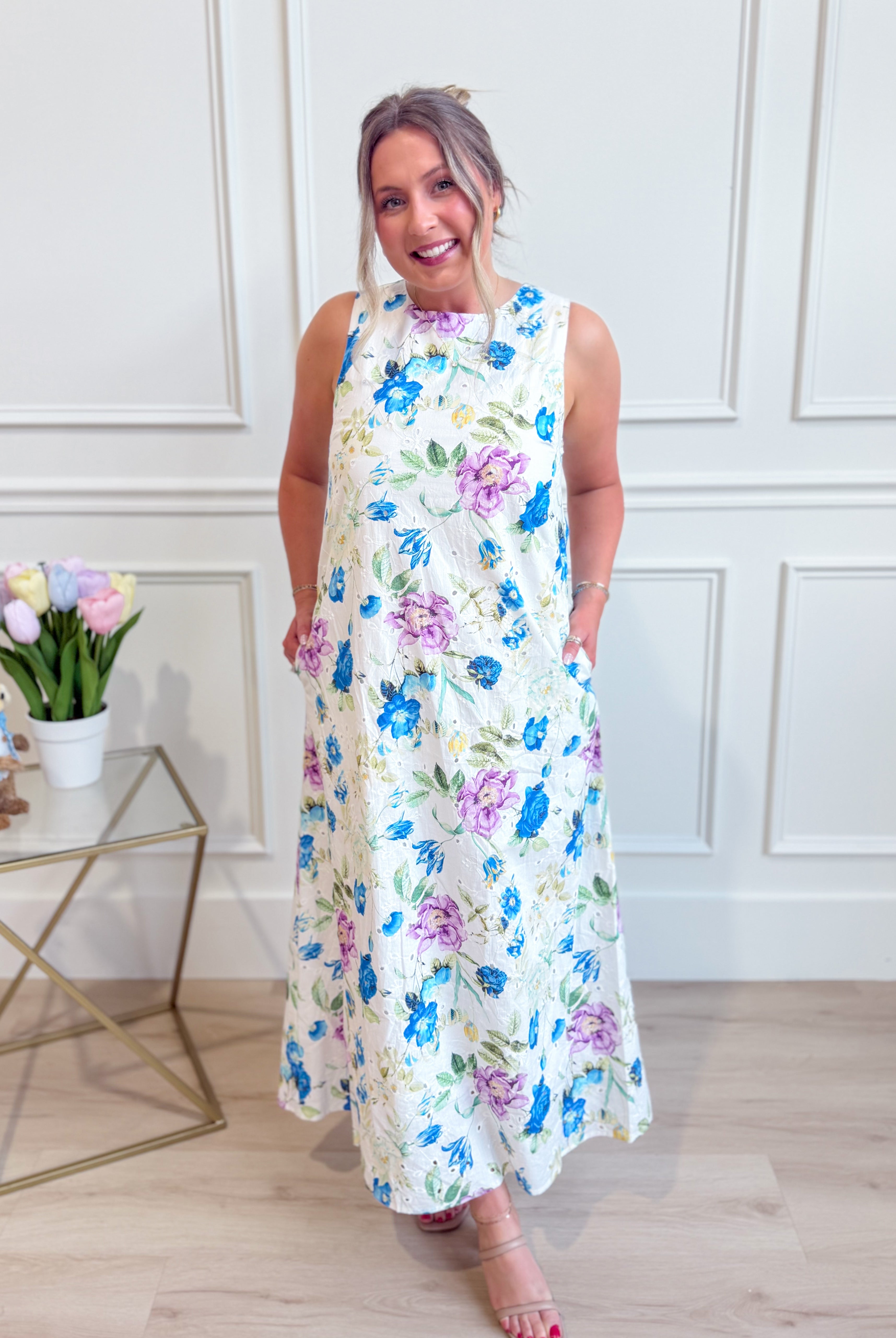 ENTRO Zoe Blue Botanical Floral Midi Dress featuring a flowy silhouette and vibrant floral print.