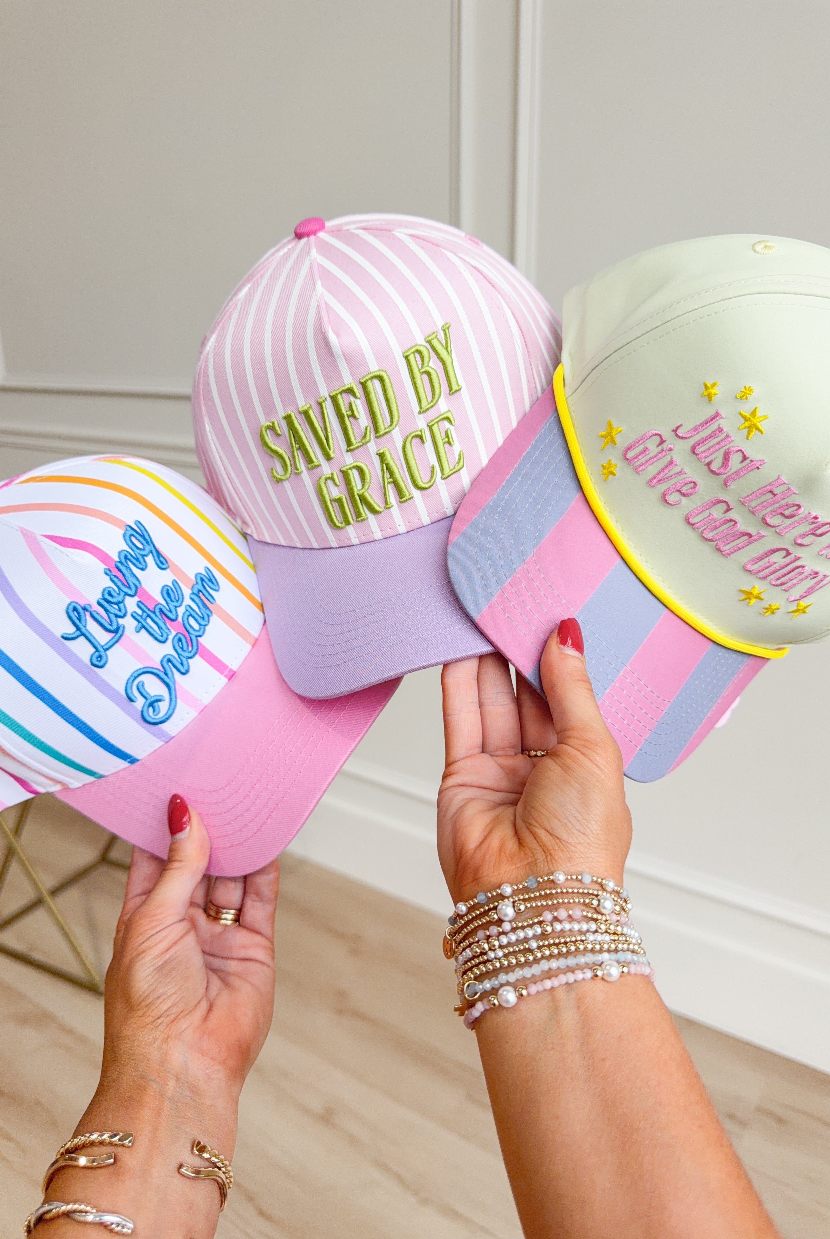 Give God Glory baseball hat by TAYLOR ELLIOT DESIGNS featuring embroidered text, casual cap style, and adjustable strap.