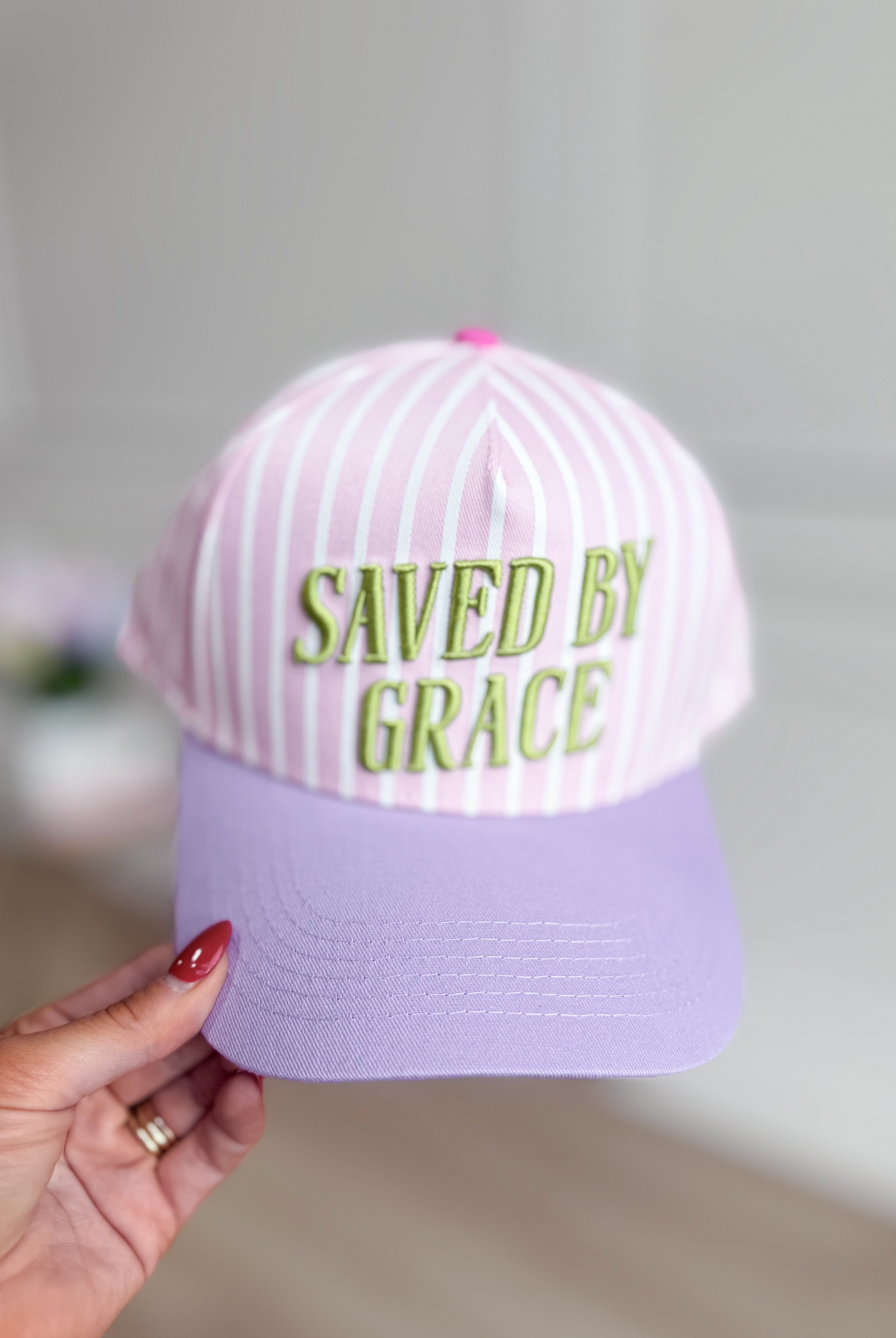 Saved By Grace baseball hat by TAYLOR ELLIOT DESIGNS, stylish 217 hair accessory with embroidered design and adjustable strap.