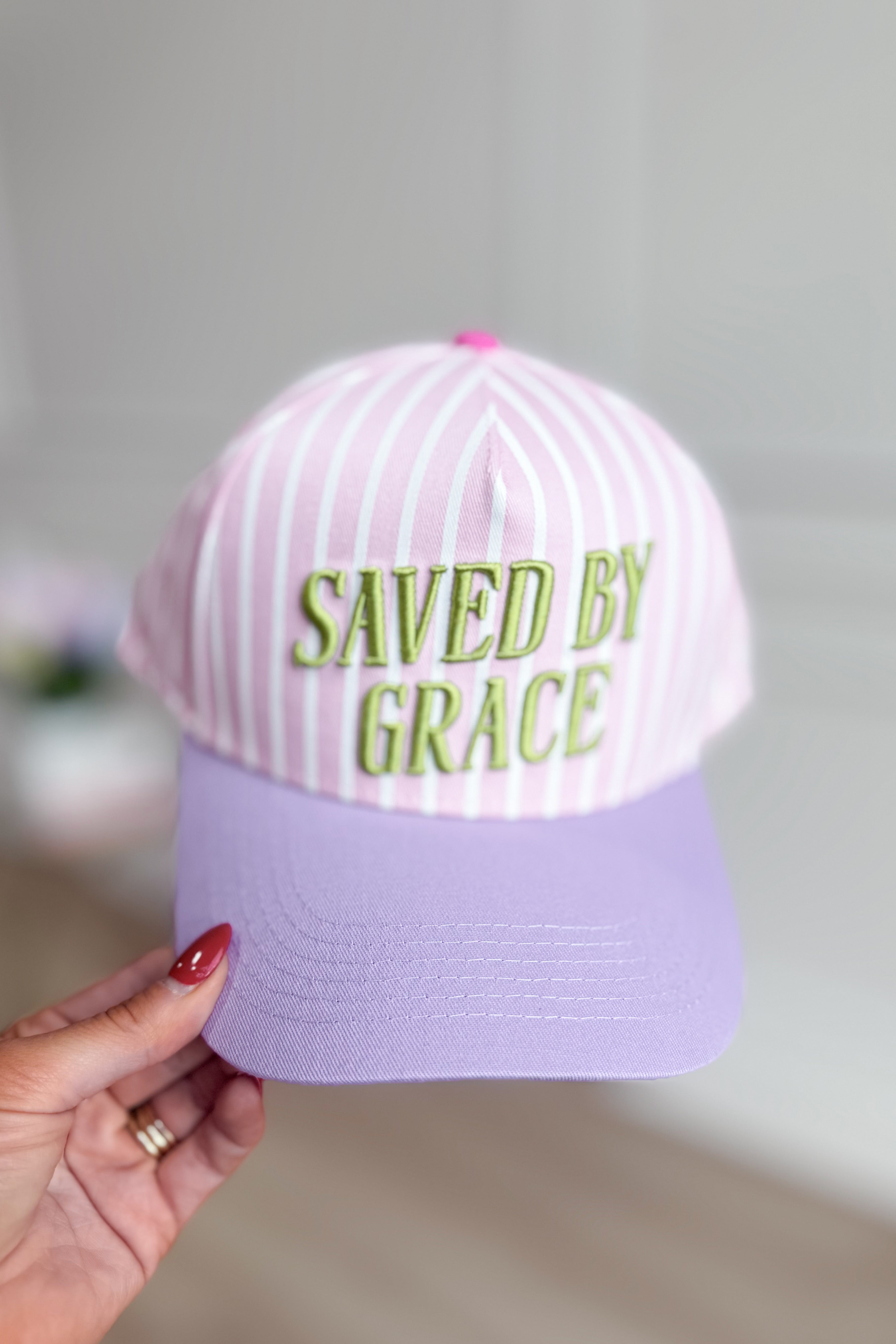Saved By Grace baseball hat by TAYLOR ELLIOT DESIGNS, stylish 217 hair accessory with embroidered design and adjustable strap.