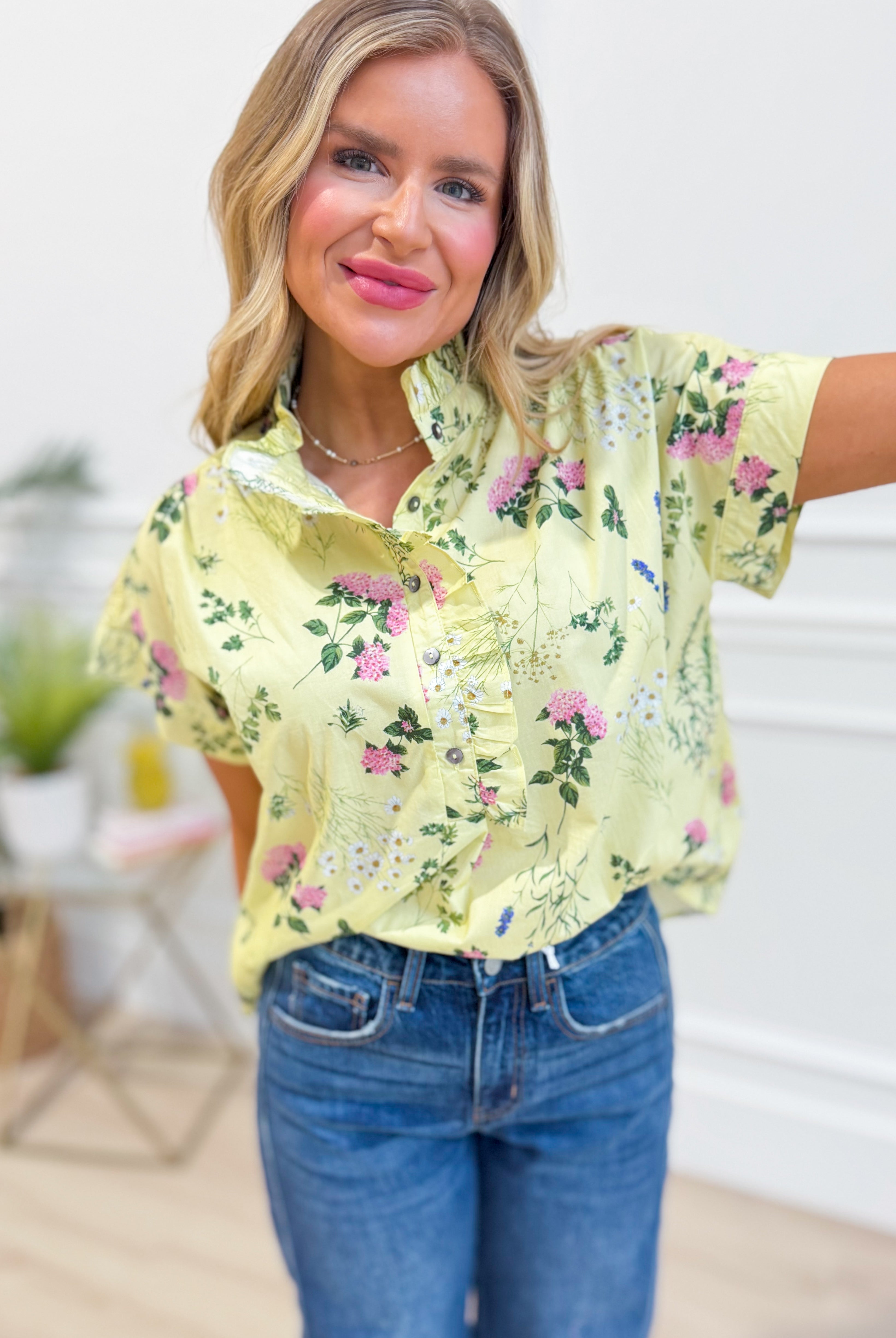 ENTRO Beth Floral Ruffle Trim Top from the 110 Dressy Tops collection, featuring a floral pattern and ruffle details.
