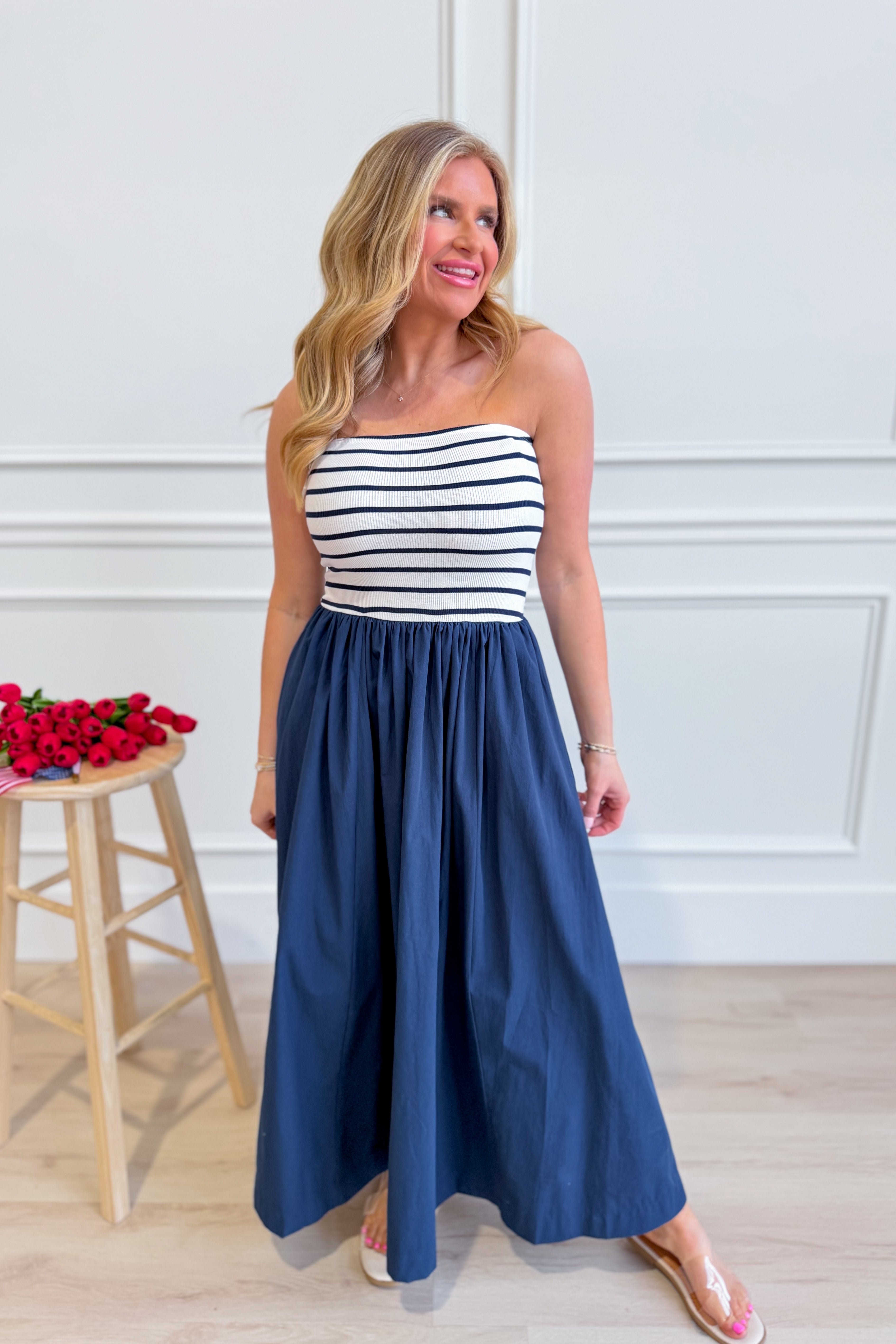 HYFVE Moana striped strapless midi dress with casual, flowing design and bold horizontal stripes, perfect for warm-weather wear.