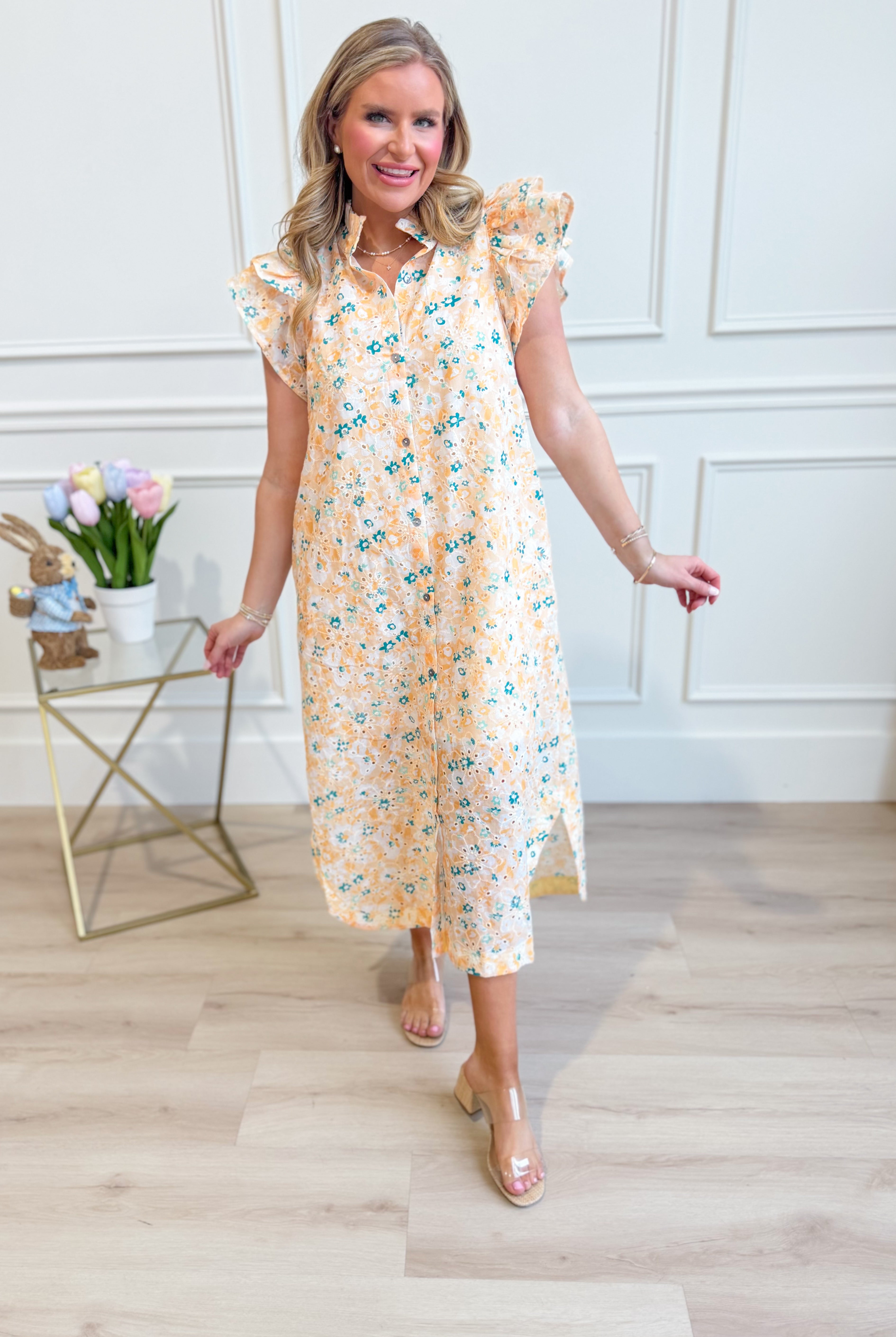 Aubrey yellow floral flutter sleeve dress by ENTRO, featuring a flowy design and vibrant floral pattern, perfect for dressy occasions.