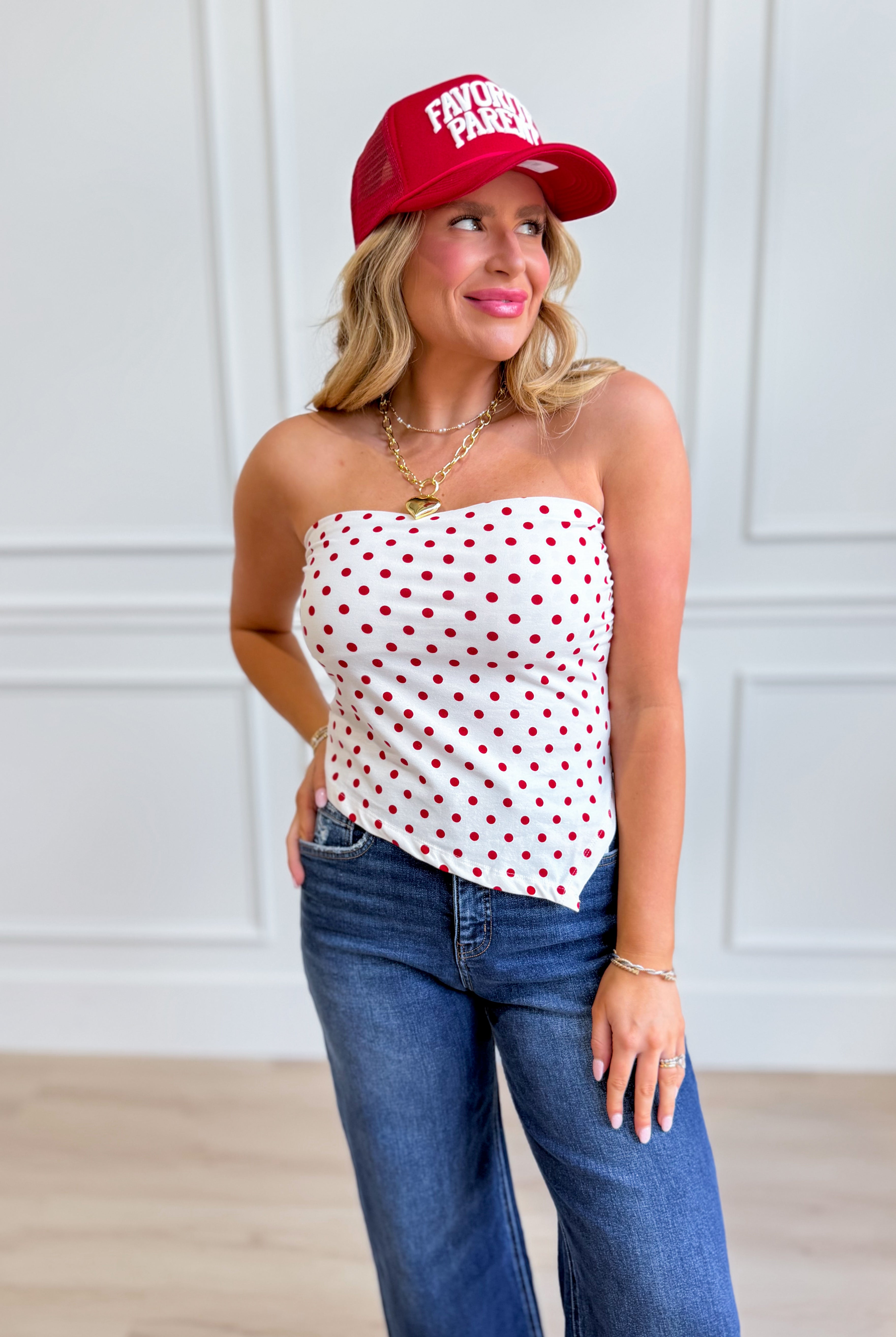 HYFVE Hannah white polka dot triangle tube top, a stylish dressy crop top with polka dot pattern and triangle neckline.