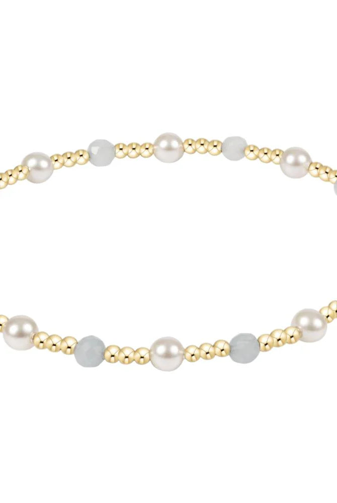 Enewton Aquamarine 4mm pearl sincerity bracelet featuring aquamarine beads on a delicate jewelry strand.
