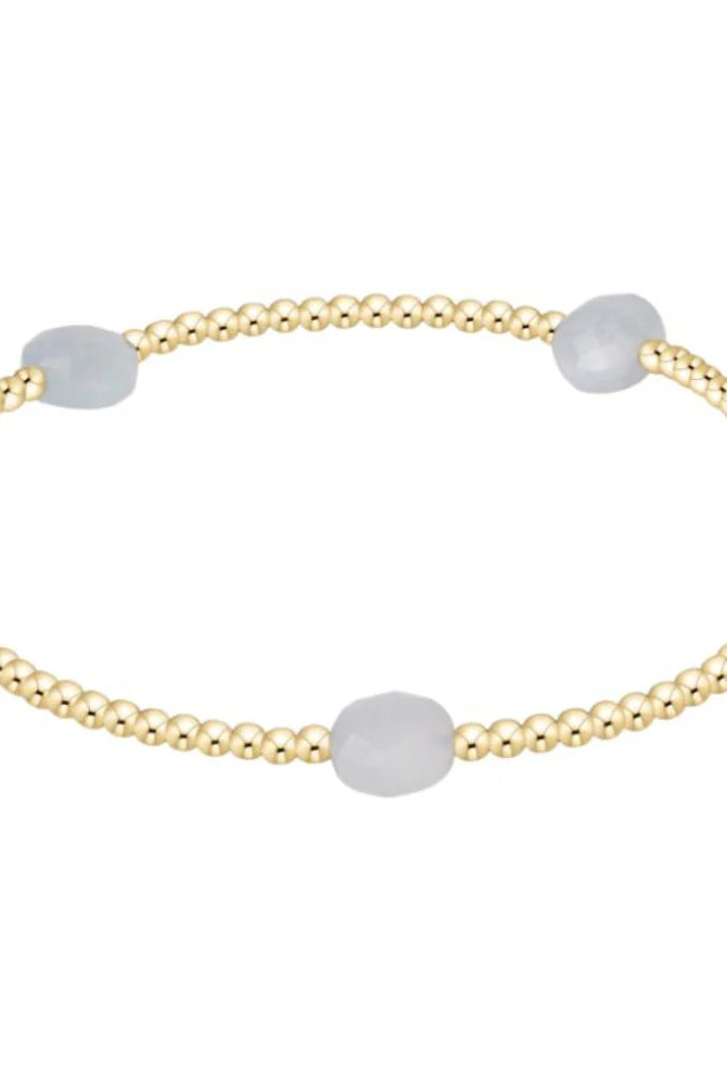 Enewton 2mm Aquamarine Admire small gemstone set in 222 jewelry piece with vibrant blue aquamarine color and polished finish.