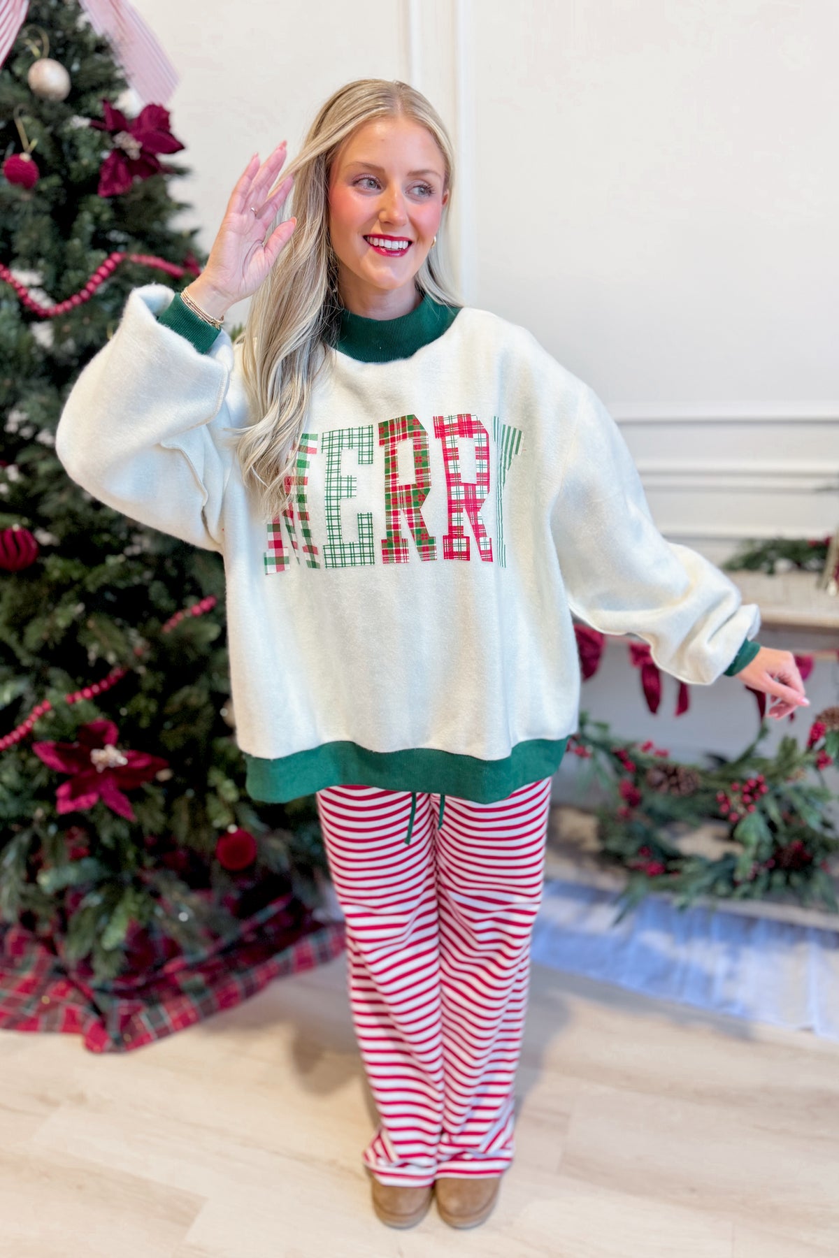 Reversible green sweatshirt with striped and graphic designs from PEACH LOVE, casual style, shown with front and back views.