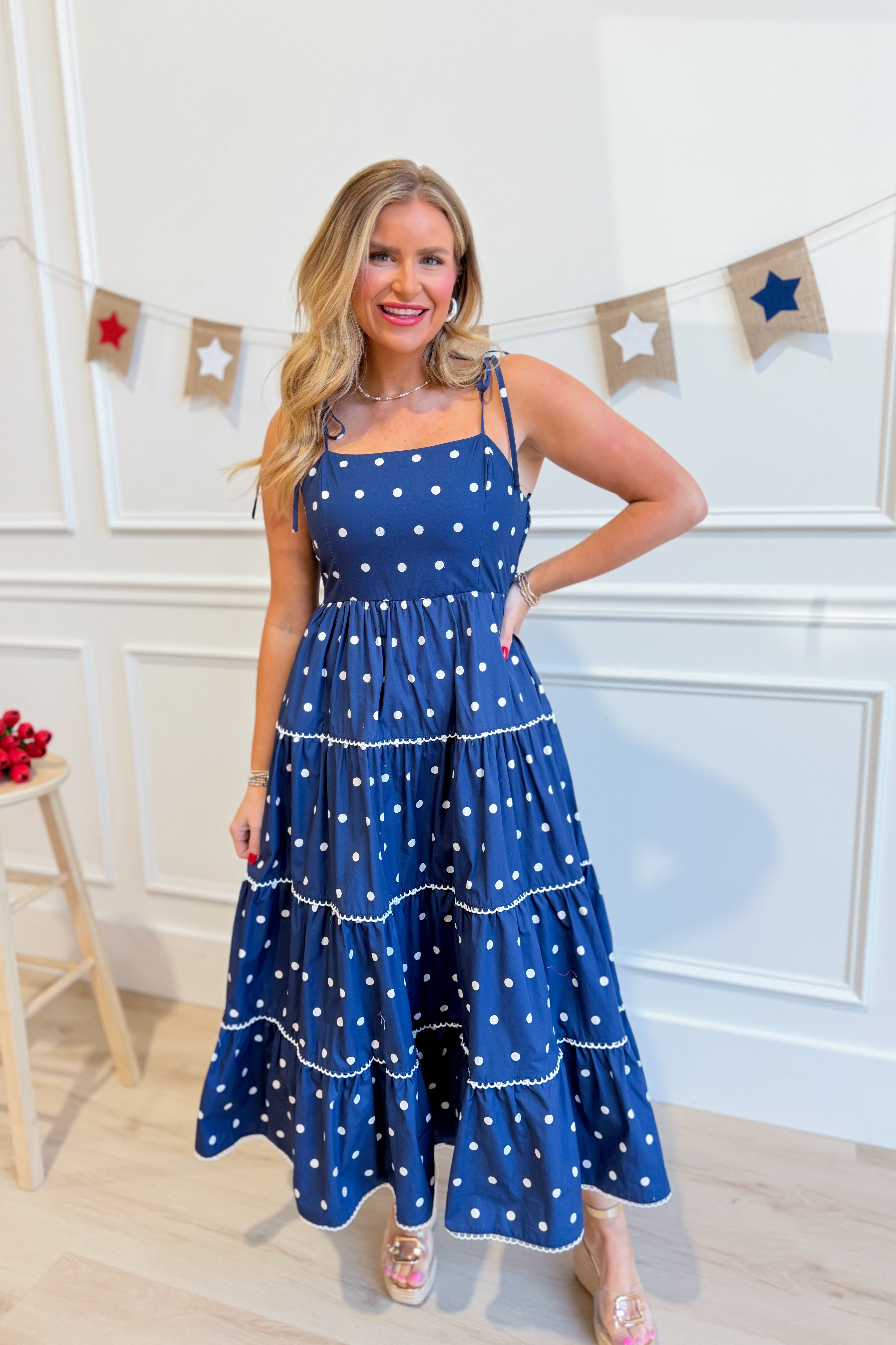 Vicki Polka Dot Tiered Midi Dress by PEACH LOVE, featuring a flowy, tiered design with black and white polka dots.