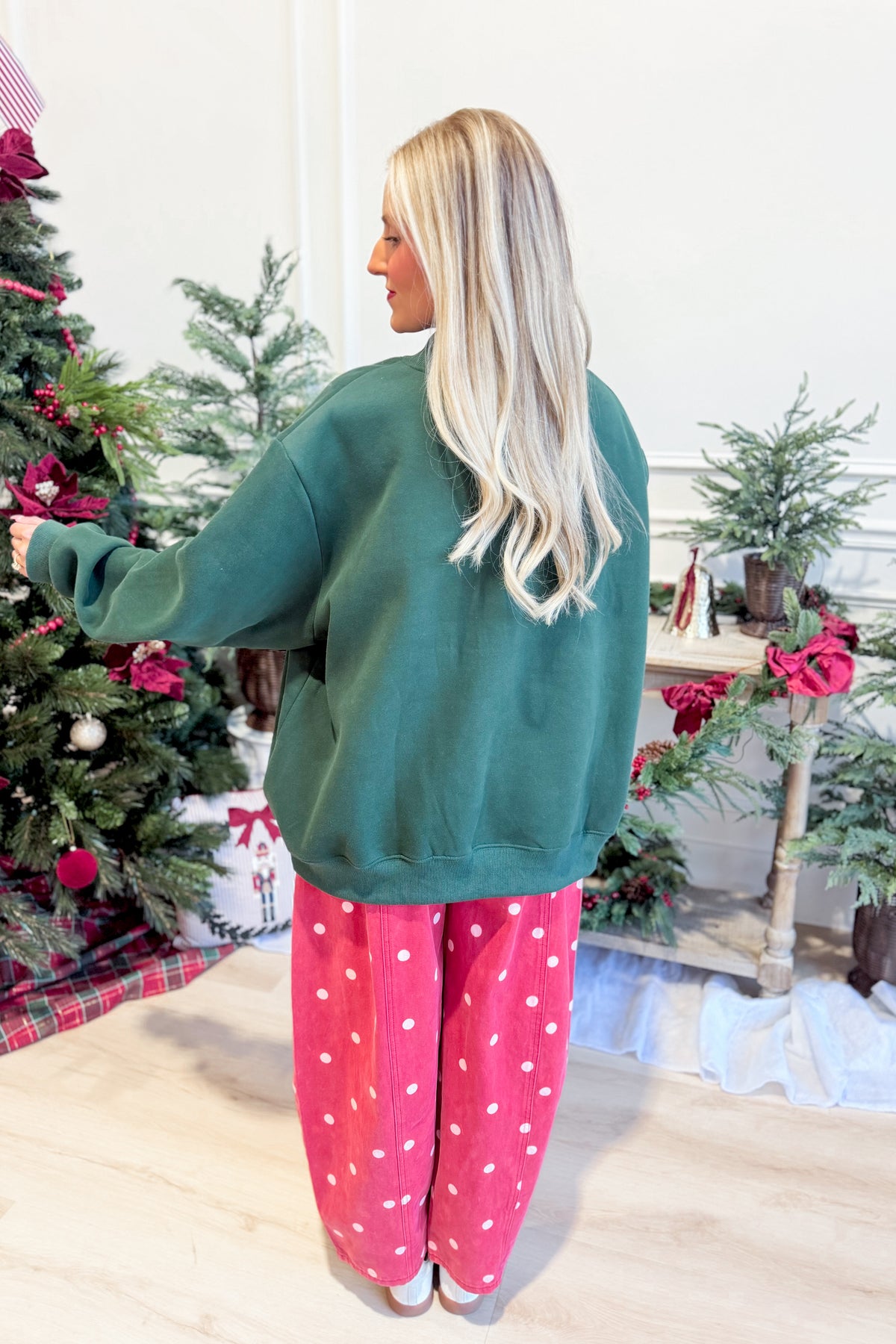 Bucket List Christmas mock neck sweatshirt featuring festive graphic design, cozy long sleeves, and soft fabric for holiday comfort.