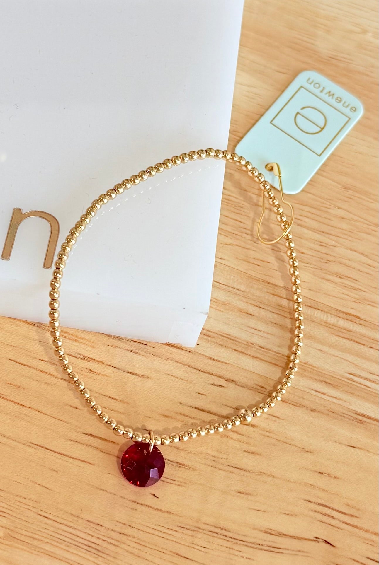 Enewton 2mm classic birthstone bracelet with small round stones and silver chain, showcasing elegant jewelry design.