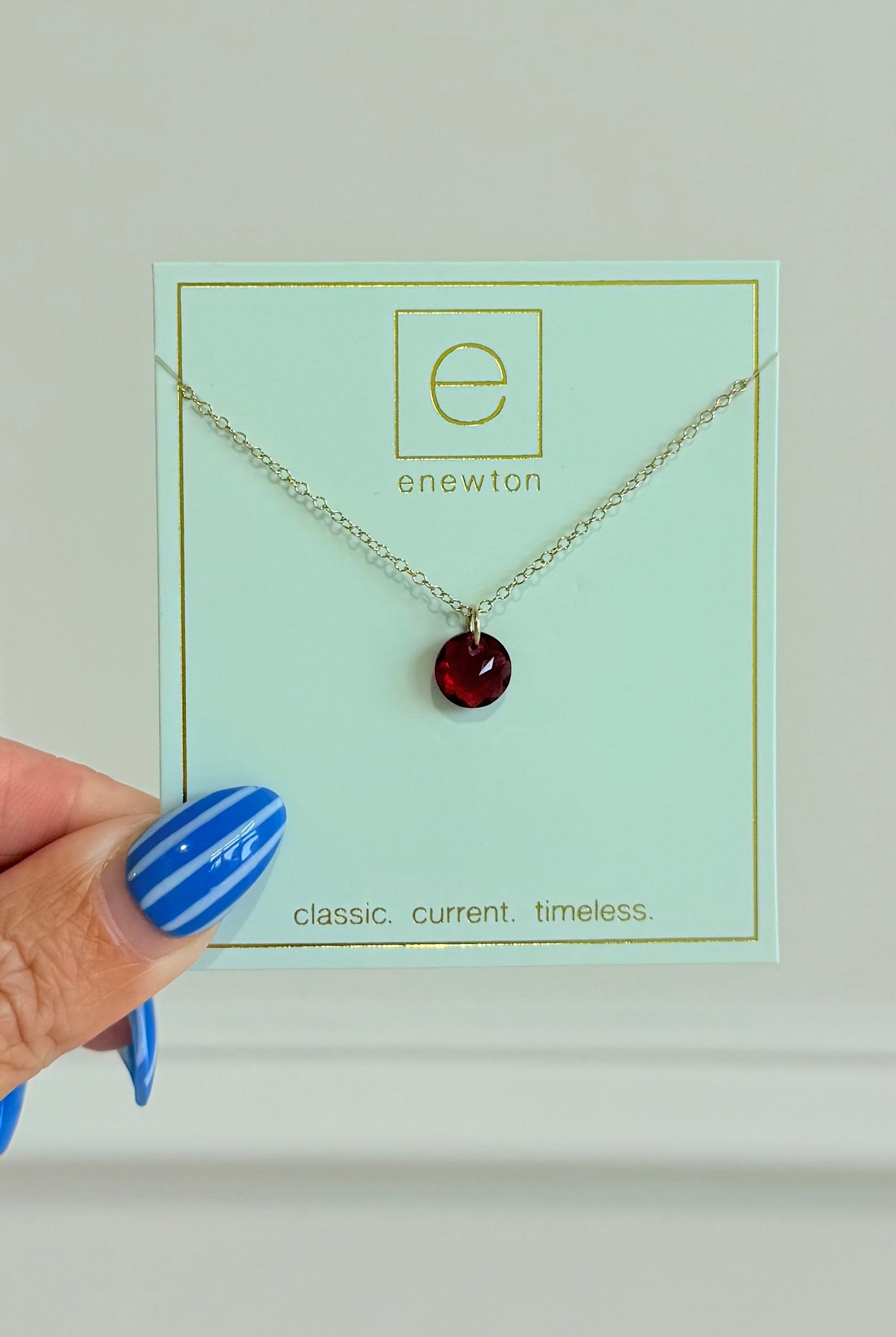 Enewton 16-inch classic birthstone necklace featuring a sparkling gemstone pendant on a silver chain.