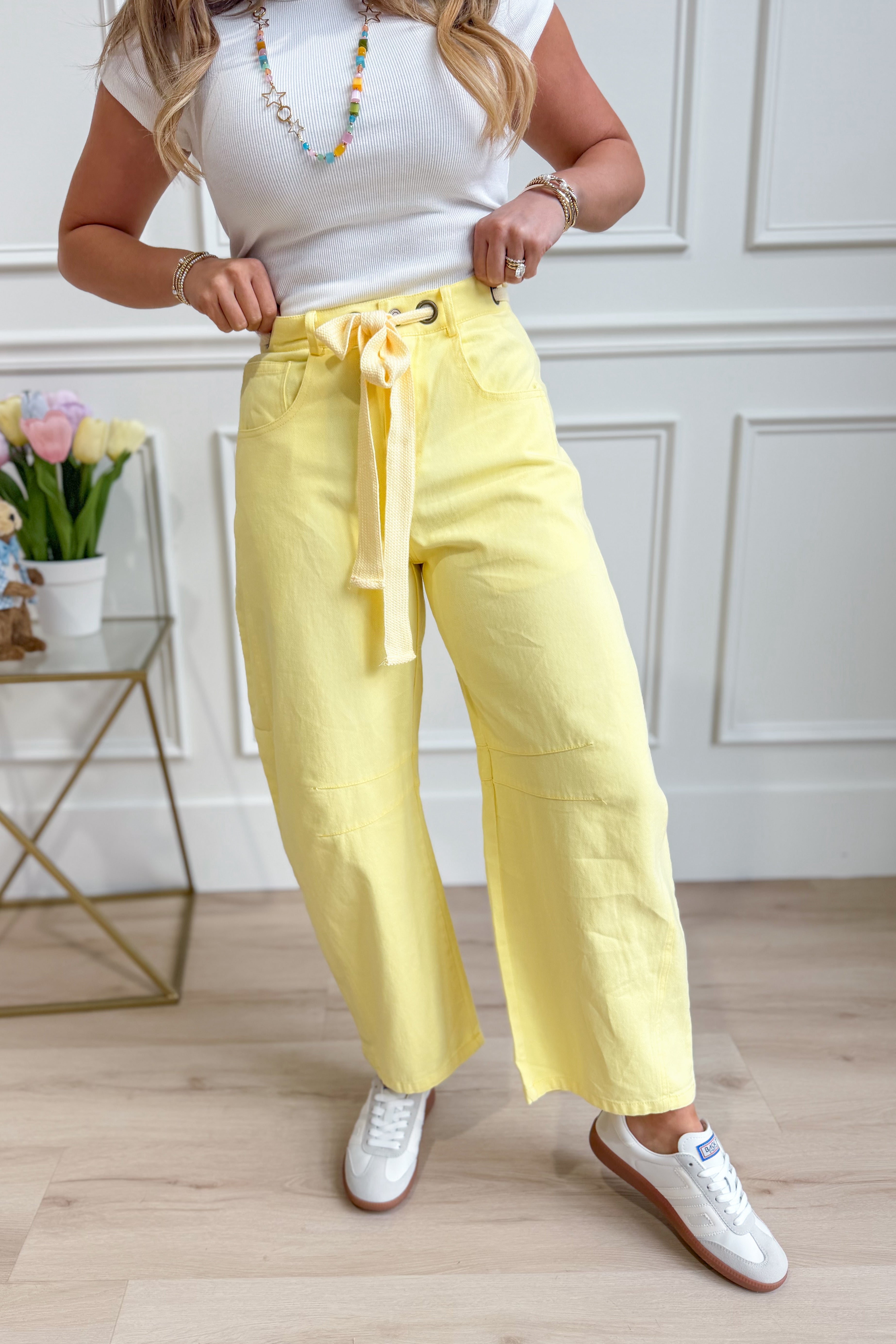 Light yellow mineral-washed PEACH LOVE Candice barrel jeans with eyelet detailing, part of the 147 Novelty Jeans collection.