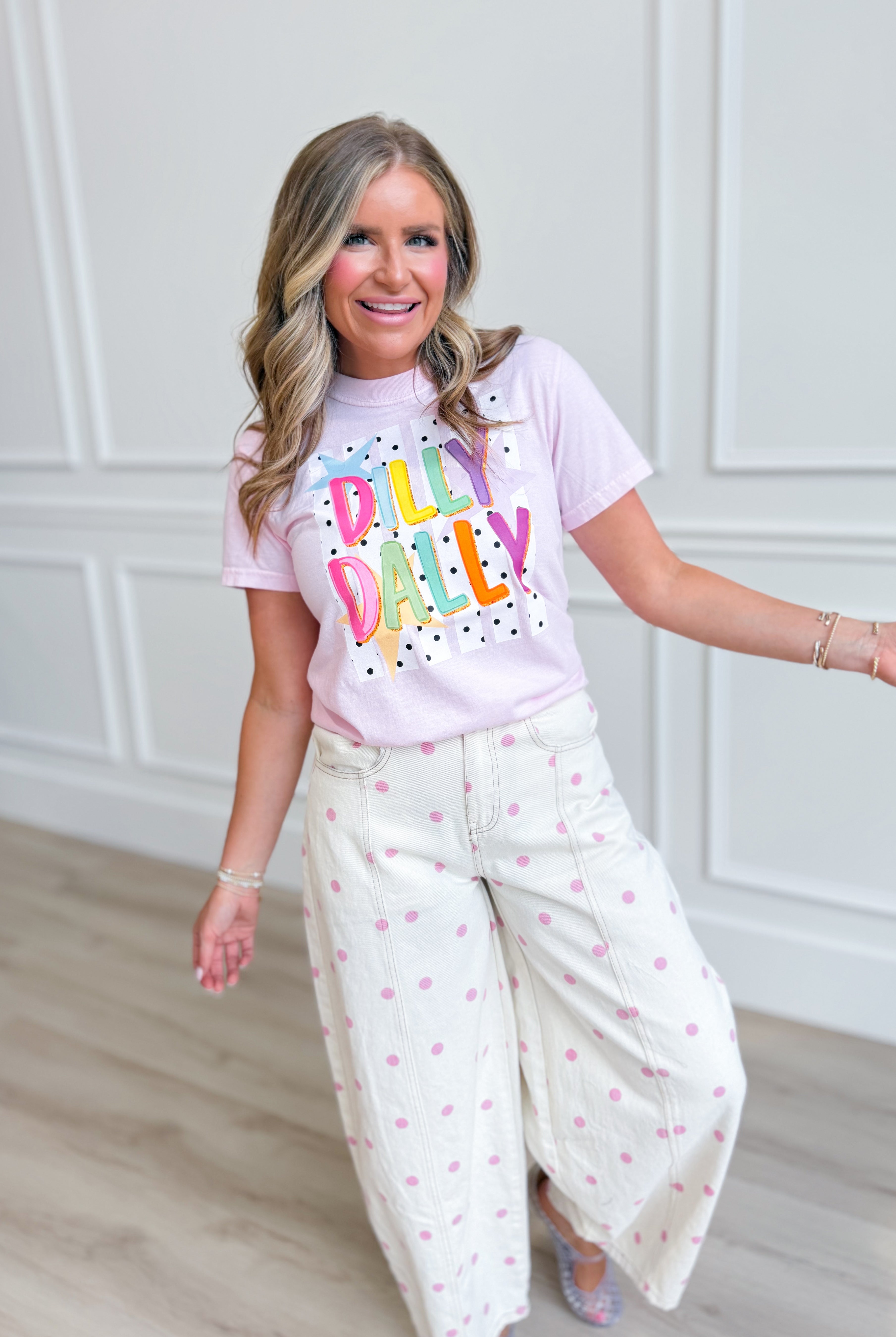 Multicolor graphic T-shirt by TWN BOUTIQUE featuring vibrant Dilly Dally design on a casual 117 Graphic Tees shirt.