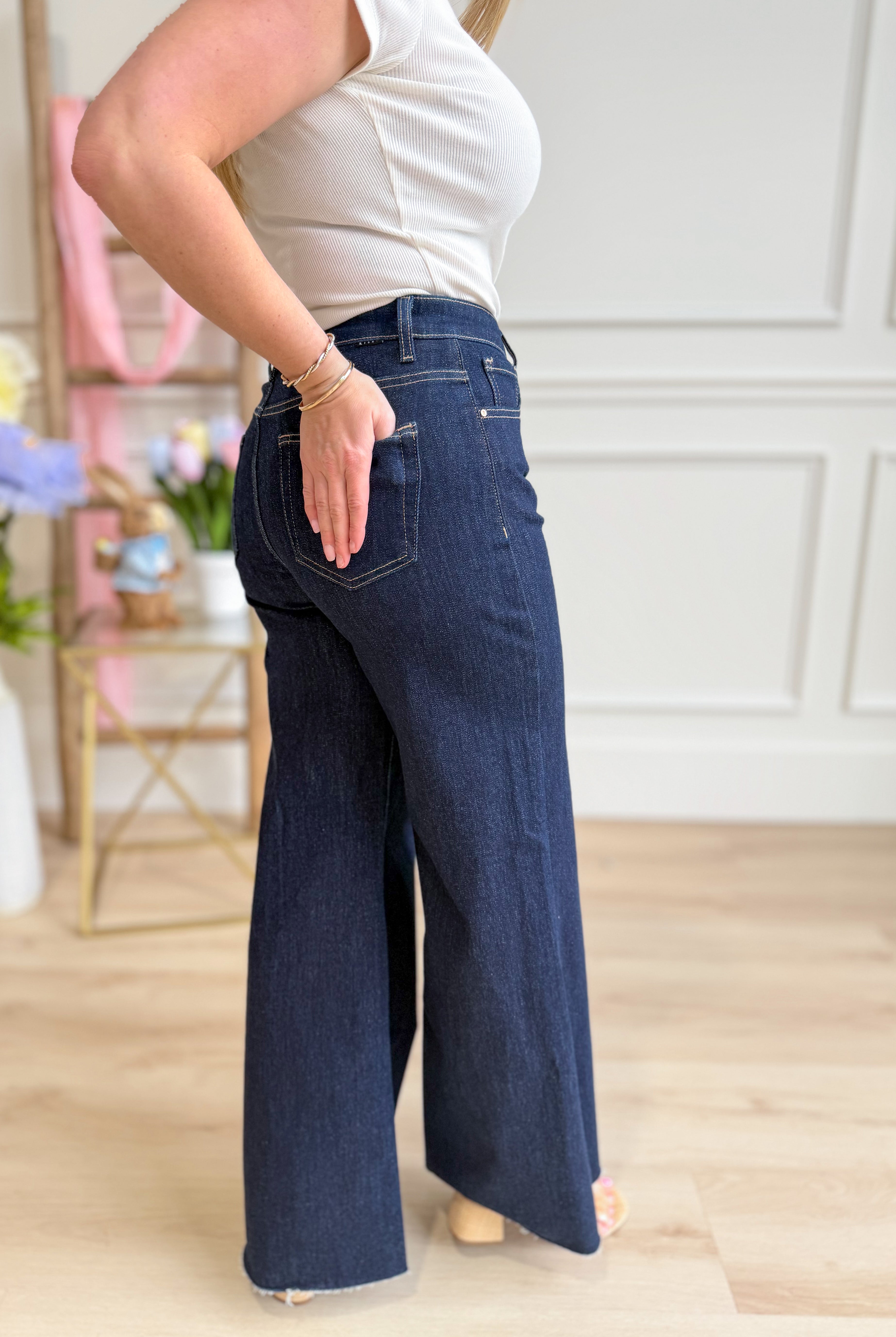 Risen Manny high-rise tummy control gold palazzo pant from 146 Core Jeans, featuring wide-leg design and sleek gold fabric.