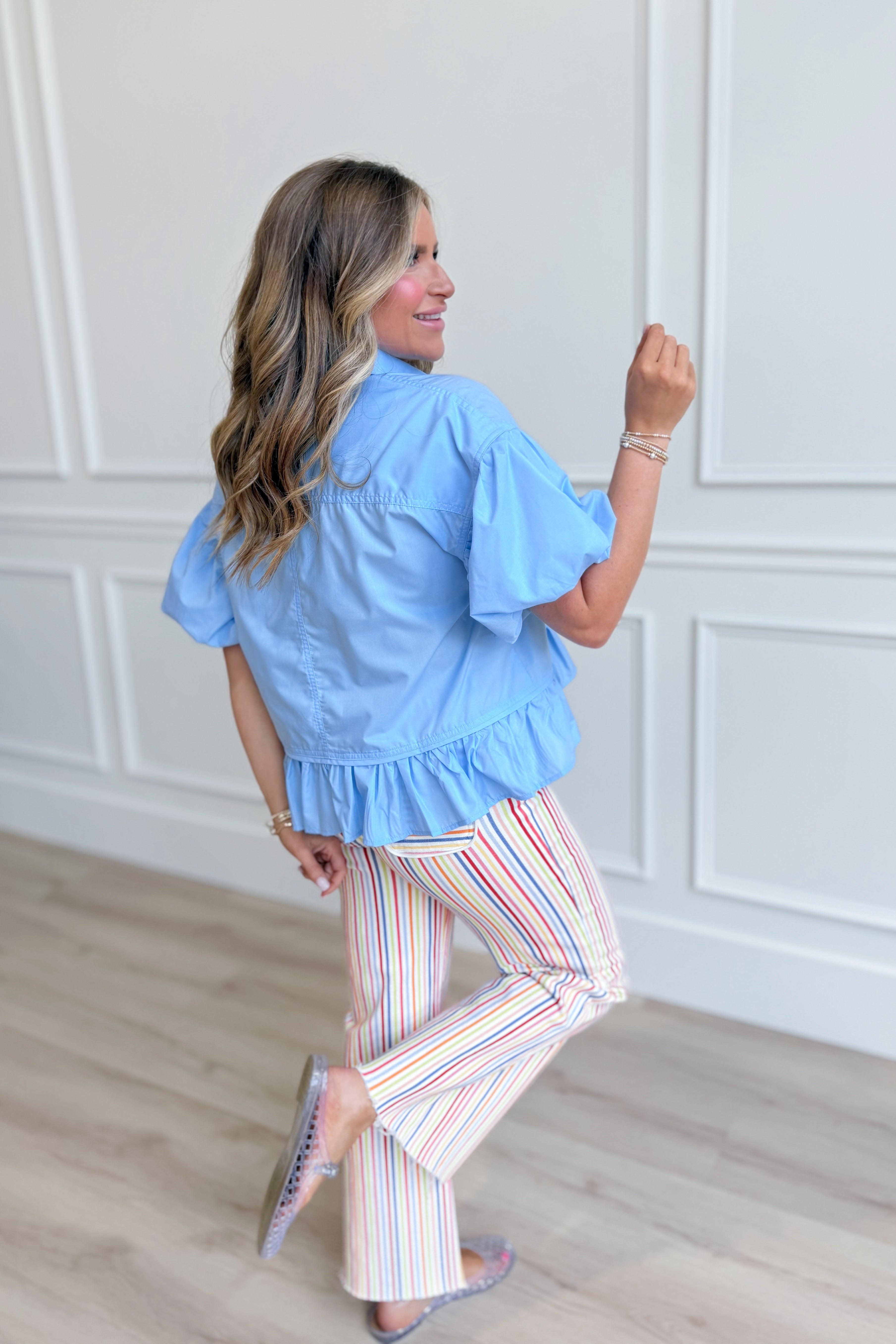Entro Maggie light blue ruffle hem casual top, 105 style, featuring flutter sleeves and soft fabric, perfect for relaxed wear.