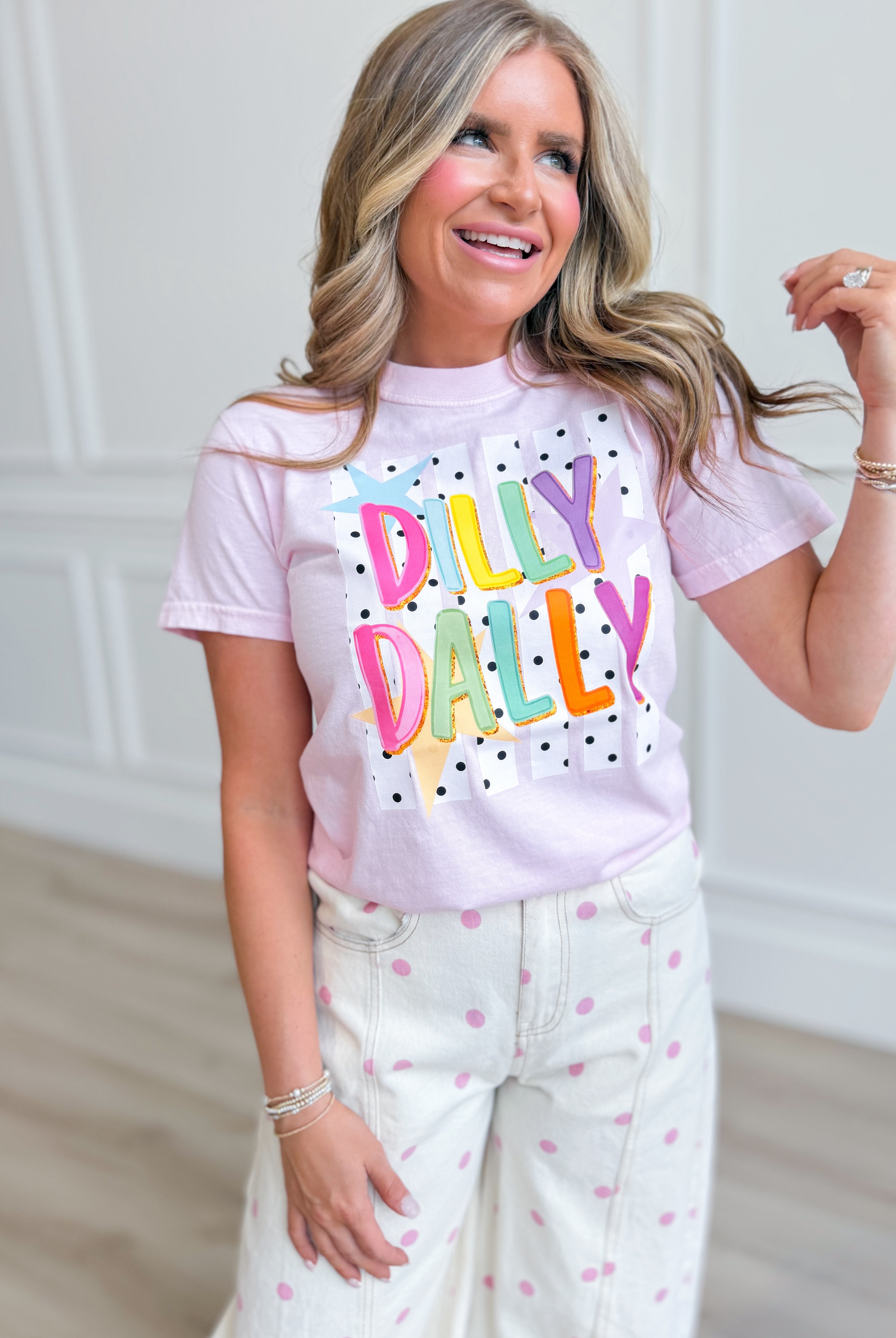 Colorful Dilly Dally graphic T-shirt from TWN BOUTIQUE featuring vibrant multi-color design and casual fit.